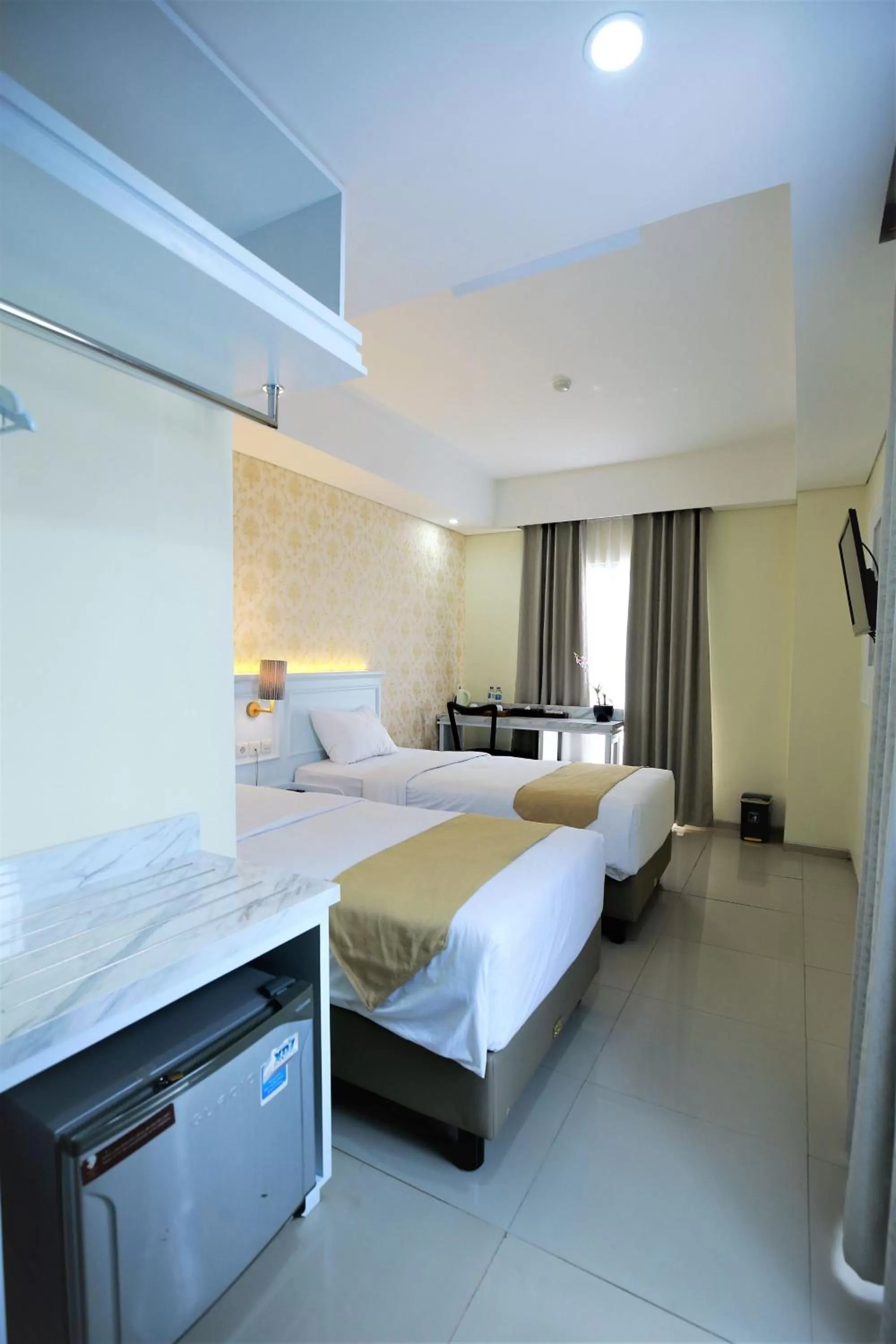 Bed in The Cube Hotel Malioboro, Azana Hotels Collection