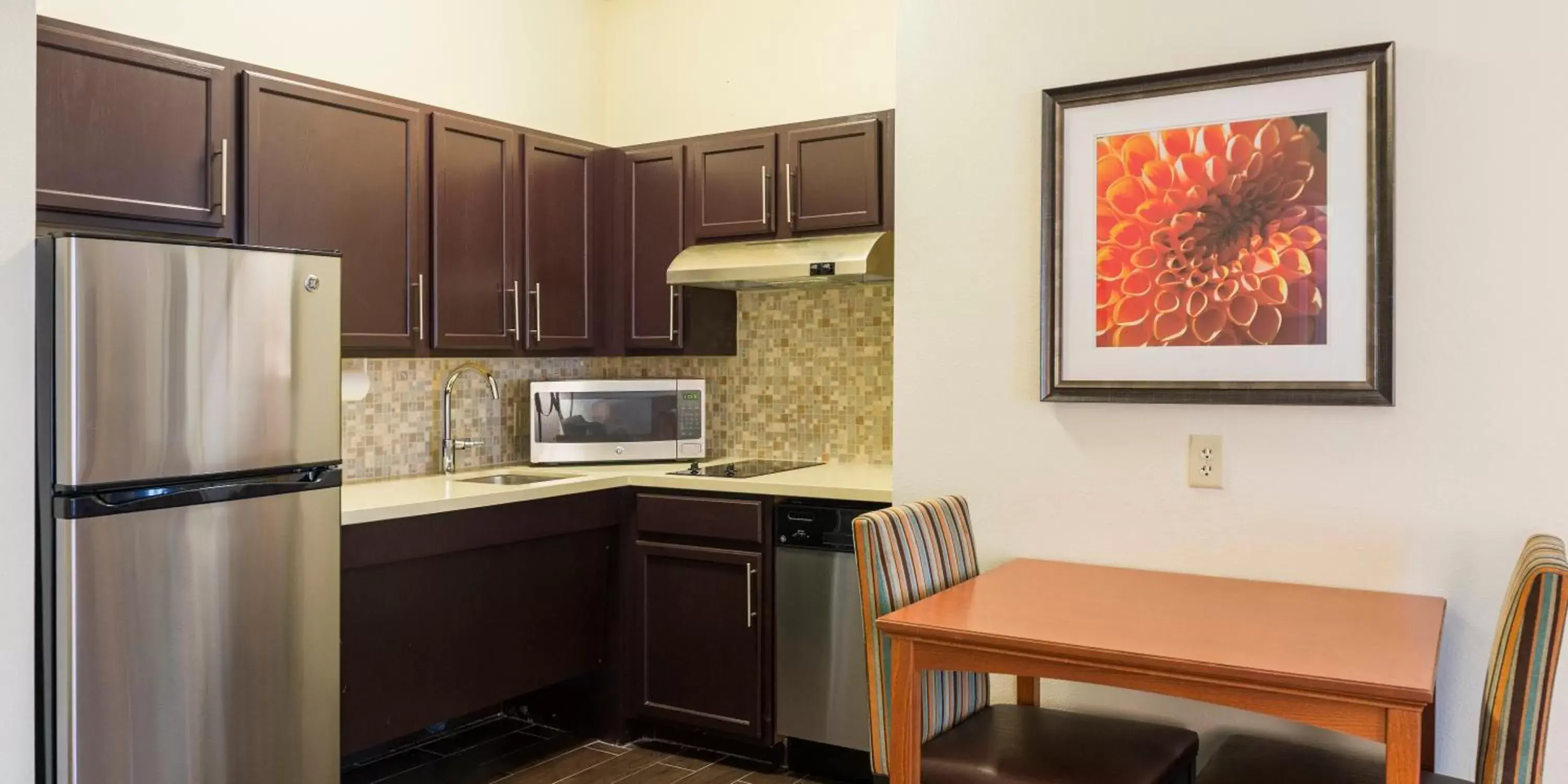 Photo of the whole room, Kitchen/Kitchenette in Staybridge Suites Fargo, an IHG Hotel