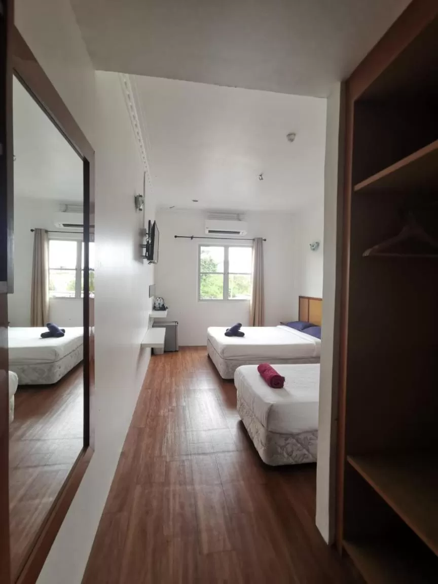 Bed in THE ZULEY HERITAGE HOTEL