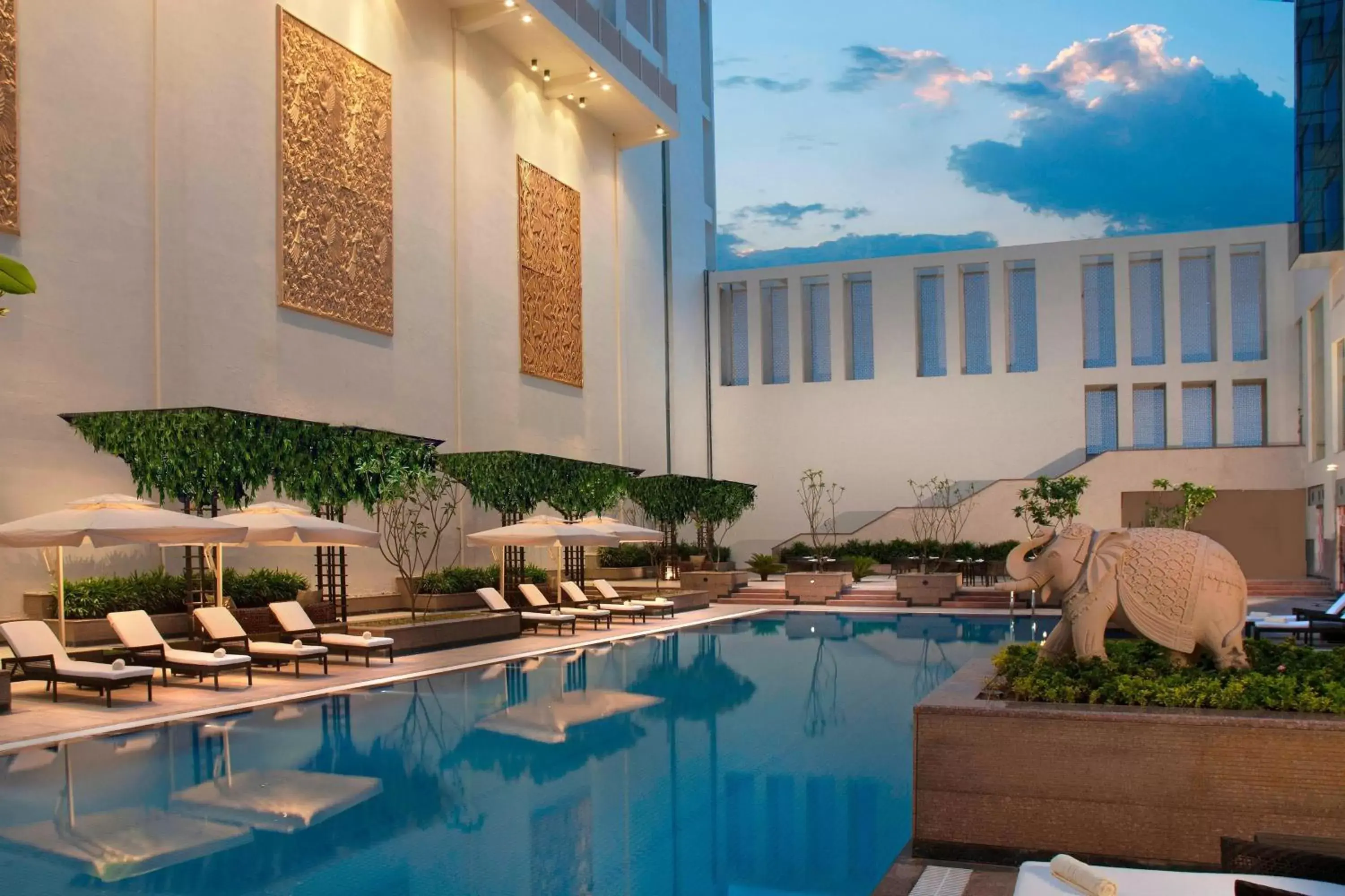 Swimming pool, Property Building in Jaipur Marriott Hotel