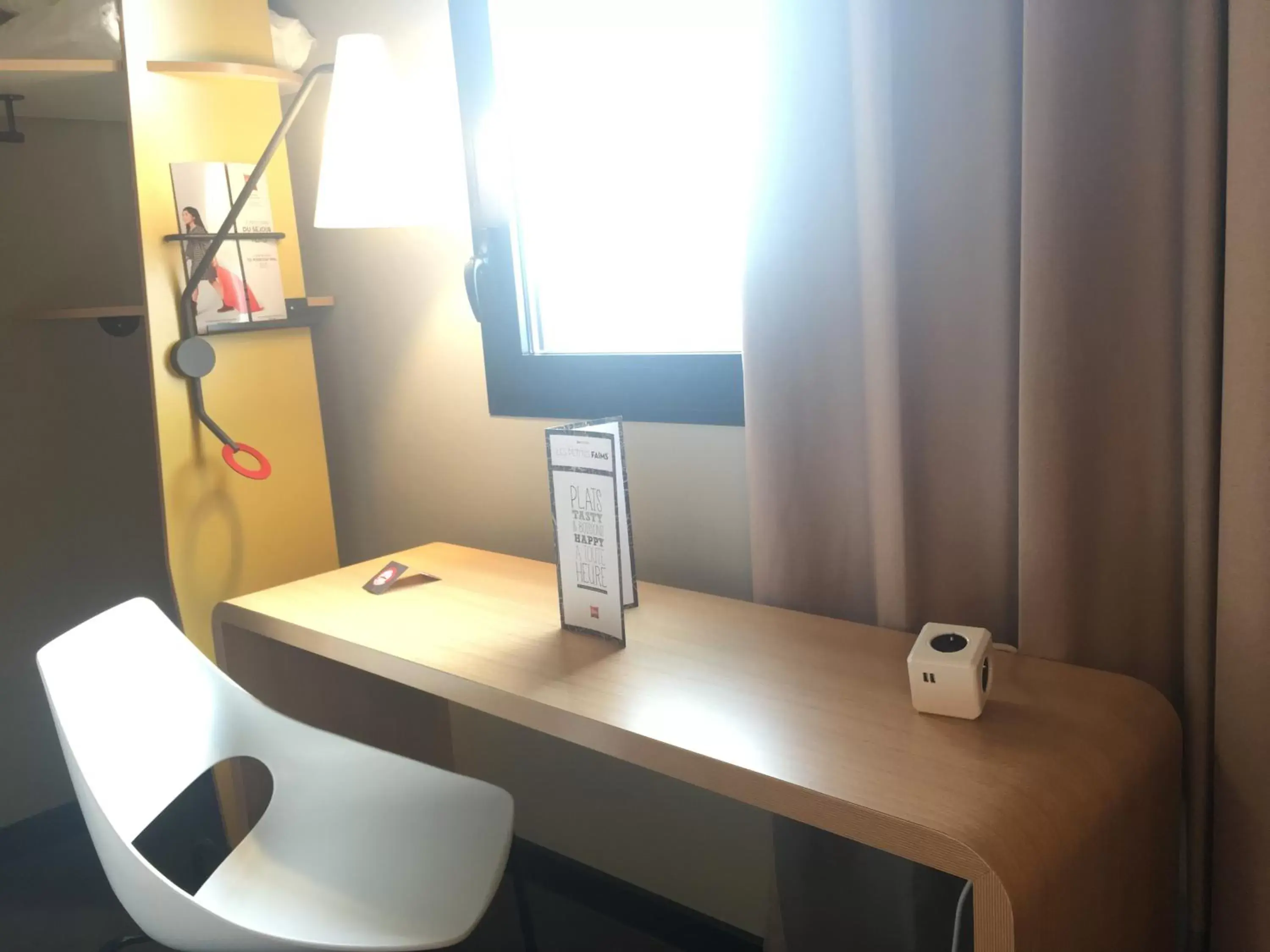 Seating area, TV/Entertainment Center in Ibis Niort Est Mendes France