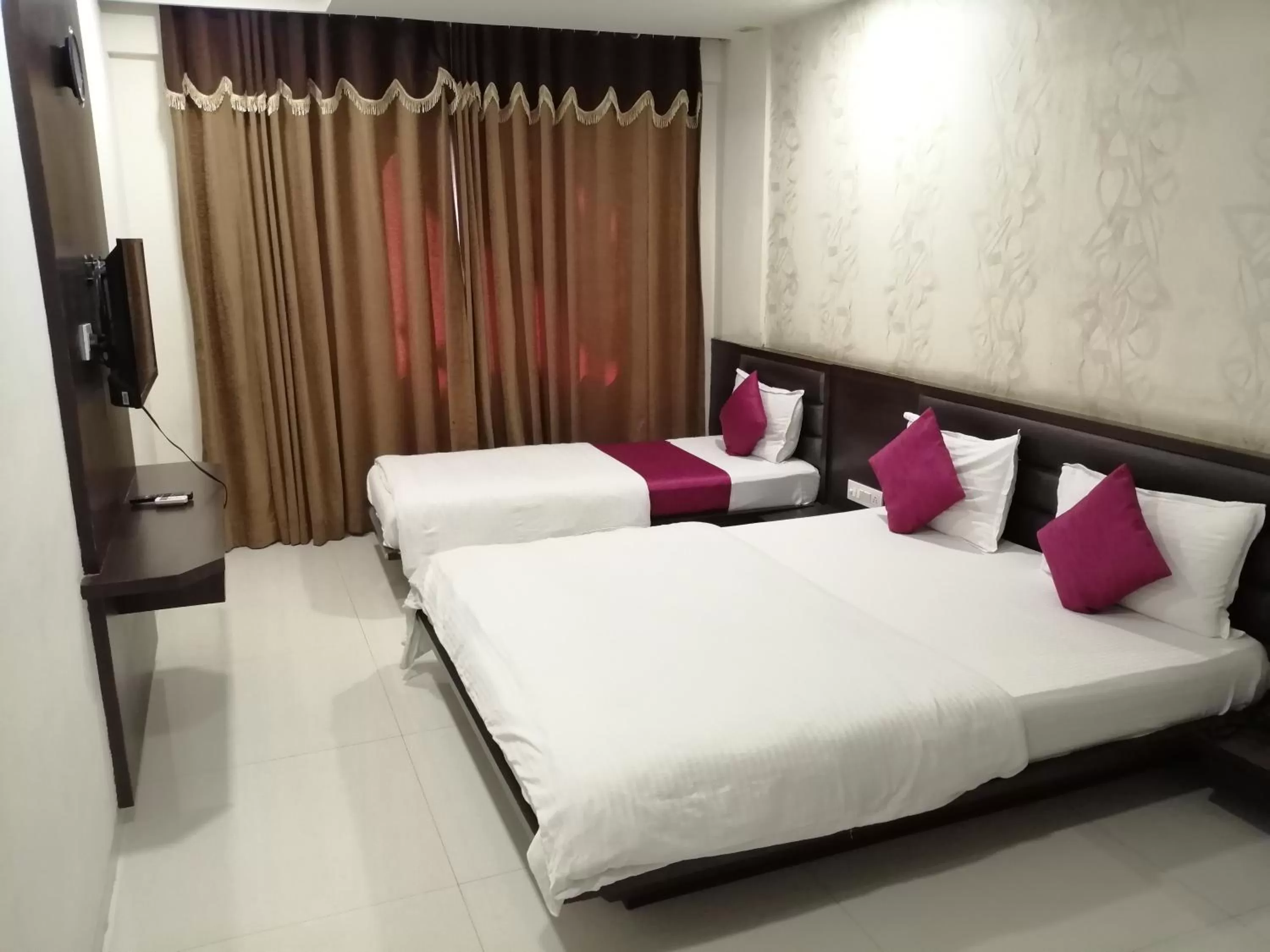 Bed in The Pacific Hotel