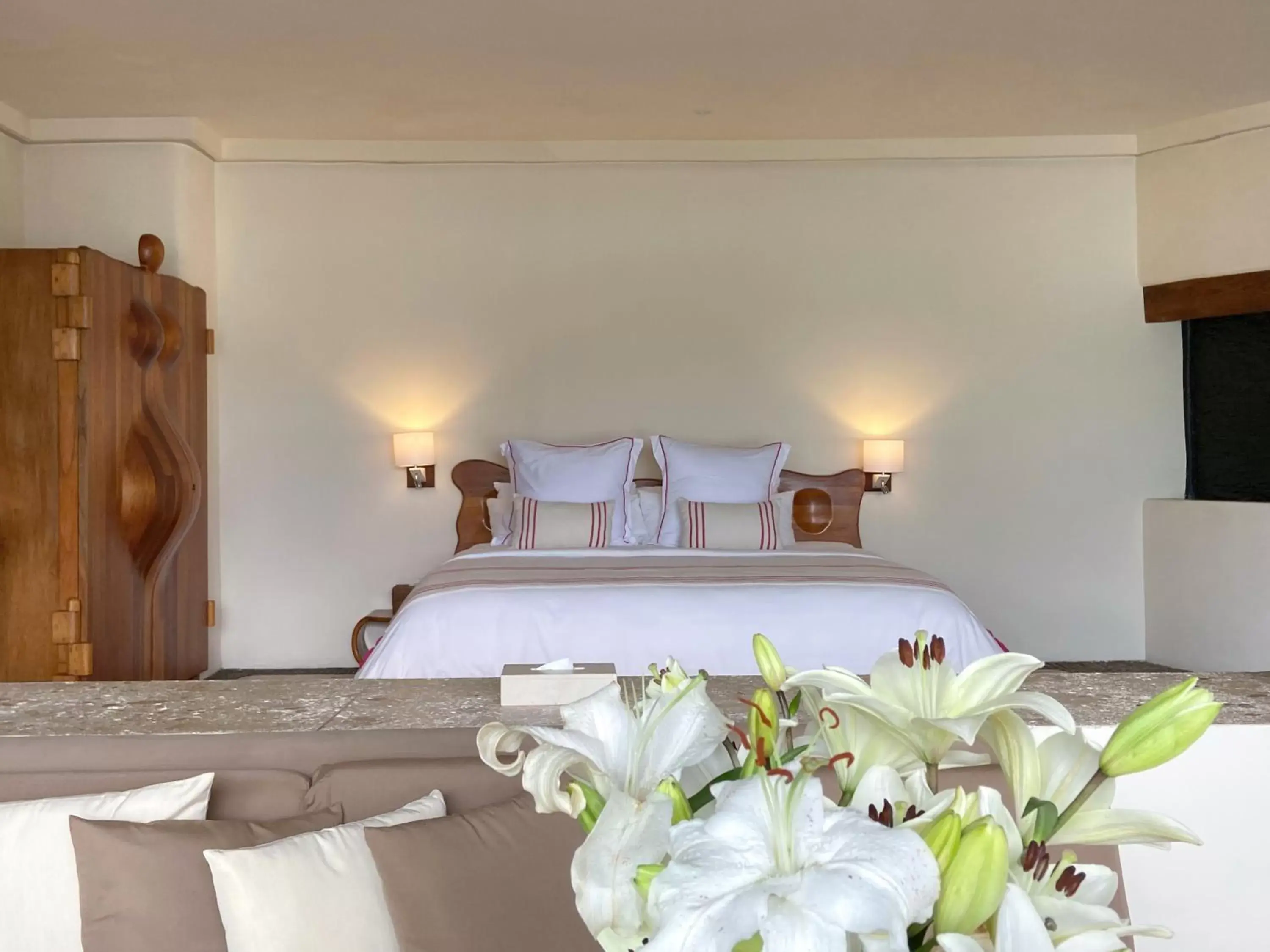 Bed in El Santuario Resort & Spa