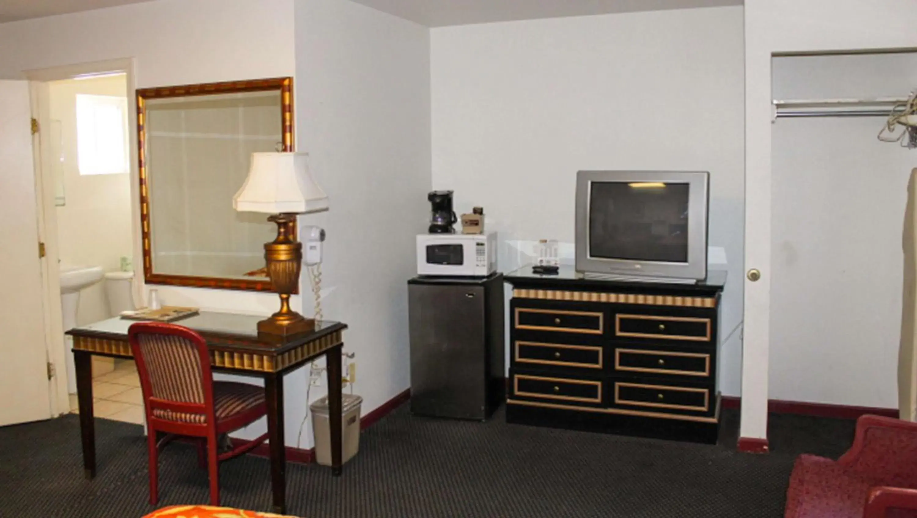Photo of the whole room, TV/Entertainment Center in Golden Wheat Budget Host Inn