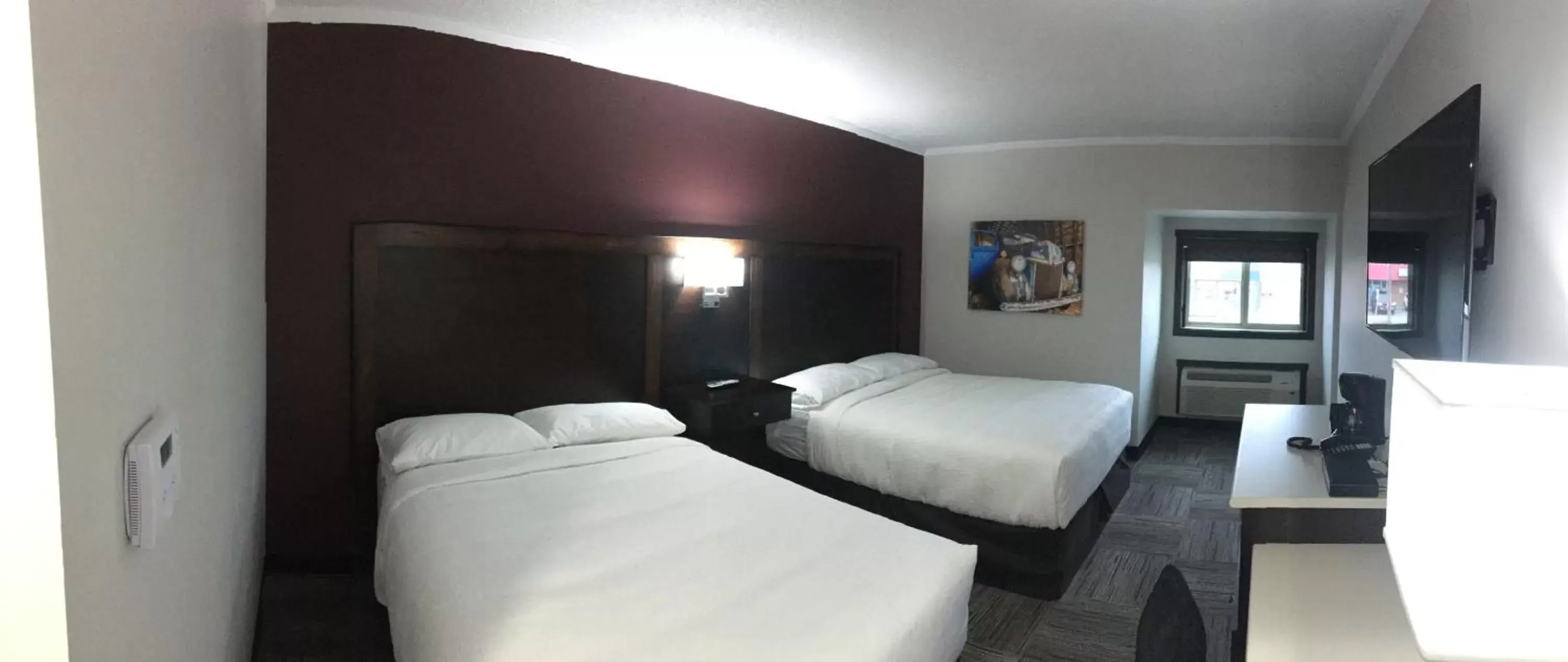 Photo of the whole room, Bed in Homestead Inn & Suites