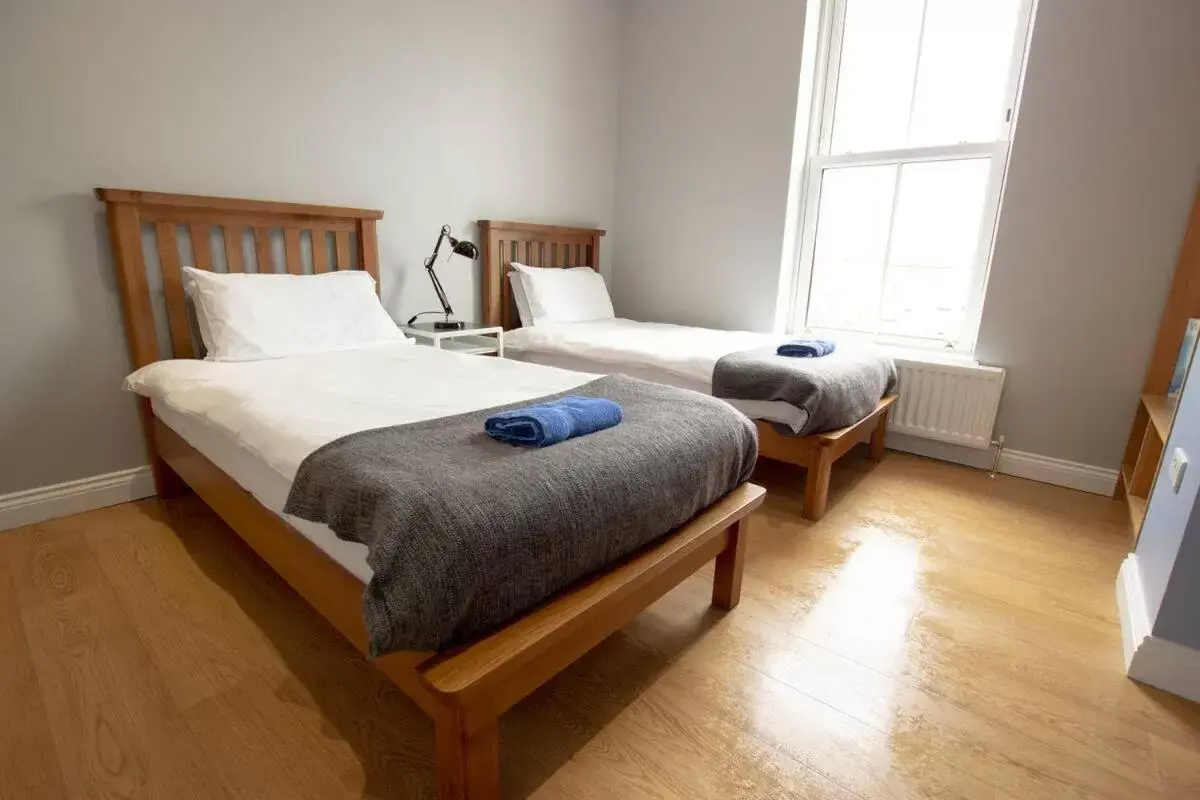 Bed in Modern City Centre Rooms