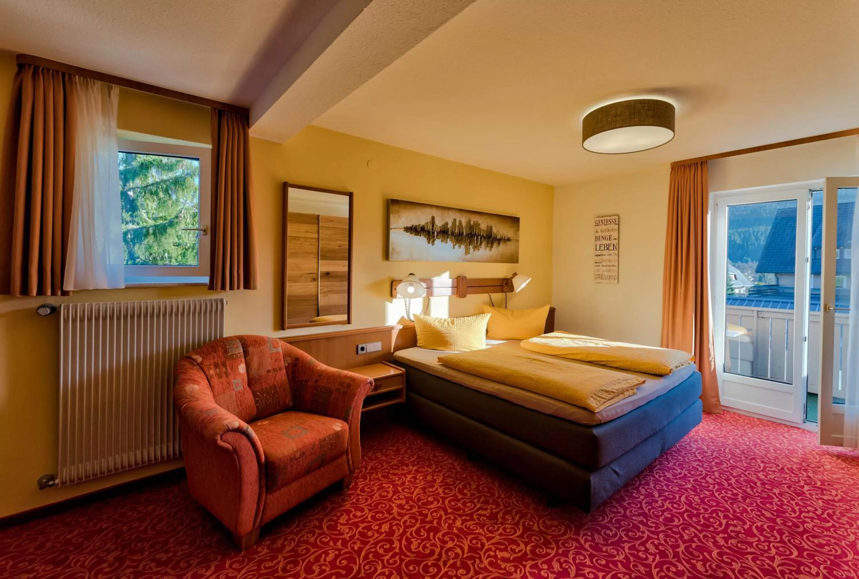 Photo of the whole room, Bed in Hotel Sonneneck Titisee -Adults Only-