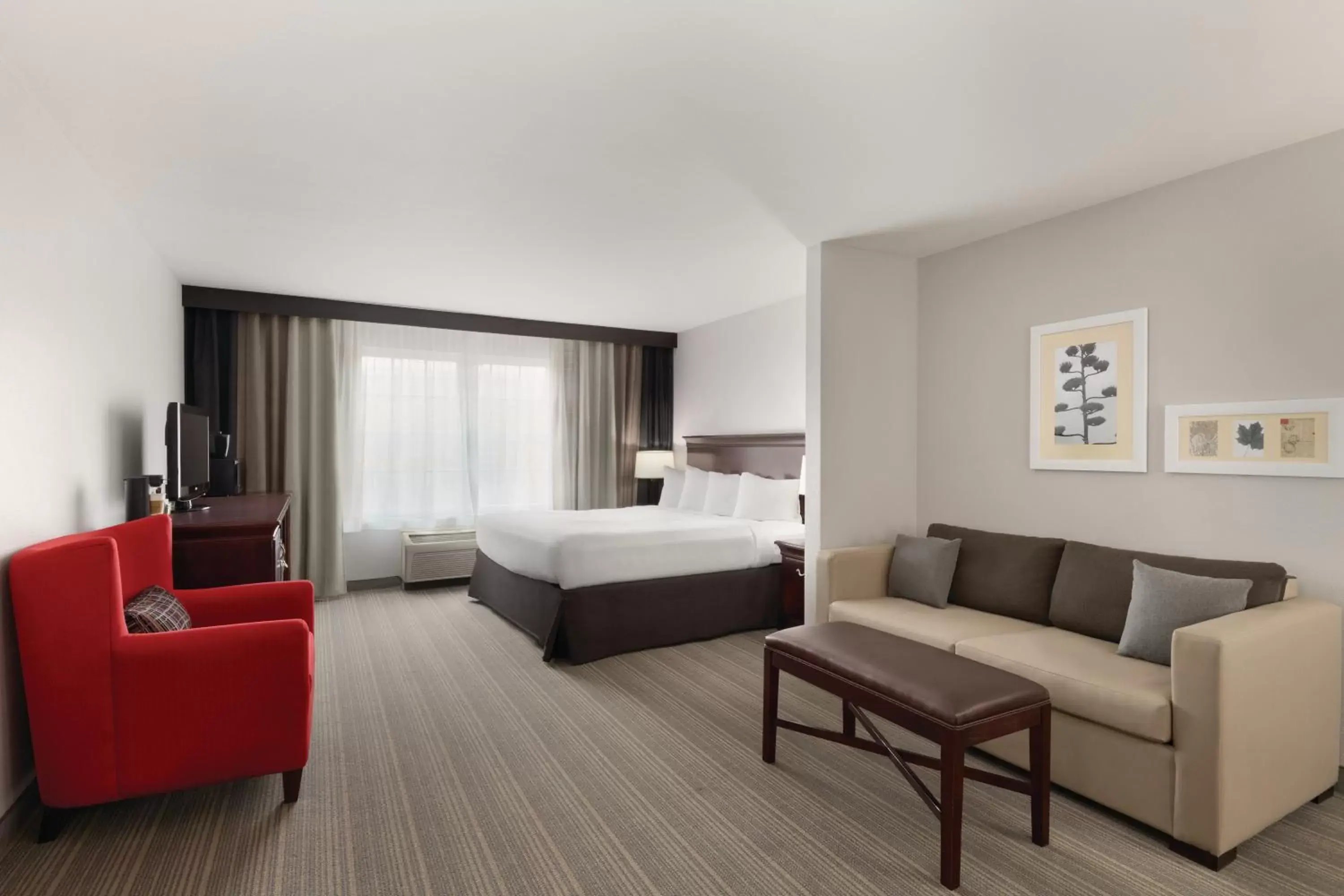 Photo of the whole room in Country Inn & Suites by Radisson, Madison, AL Photo of the whole room in Country Inn & Suites by Radisson, Madison, AL