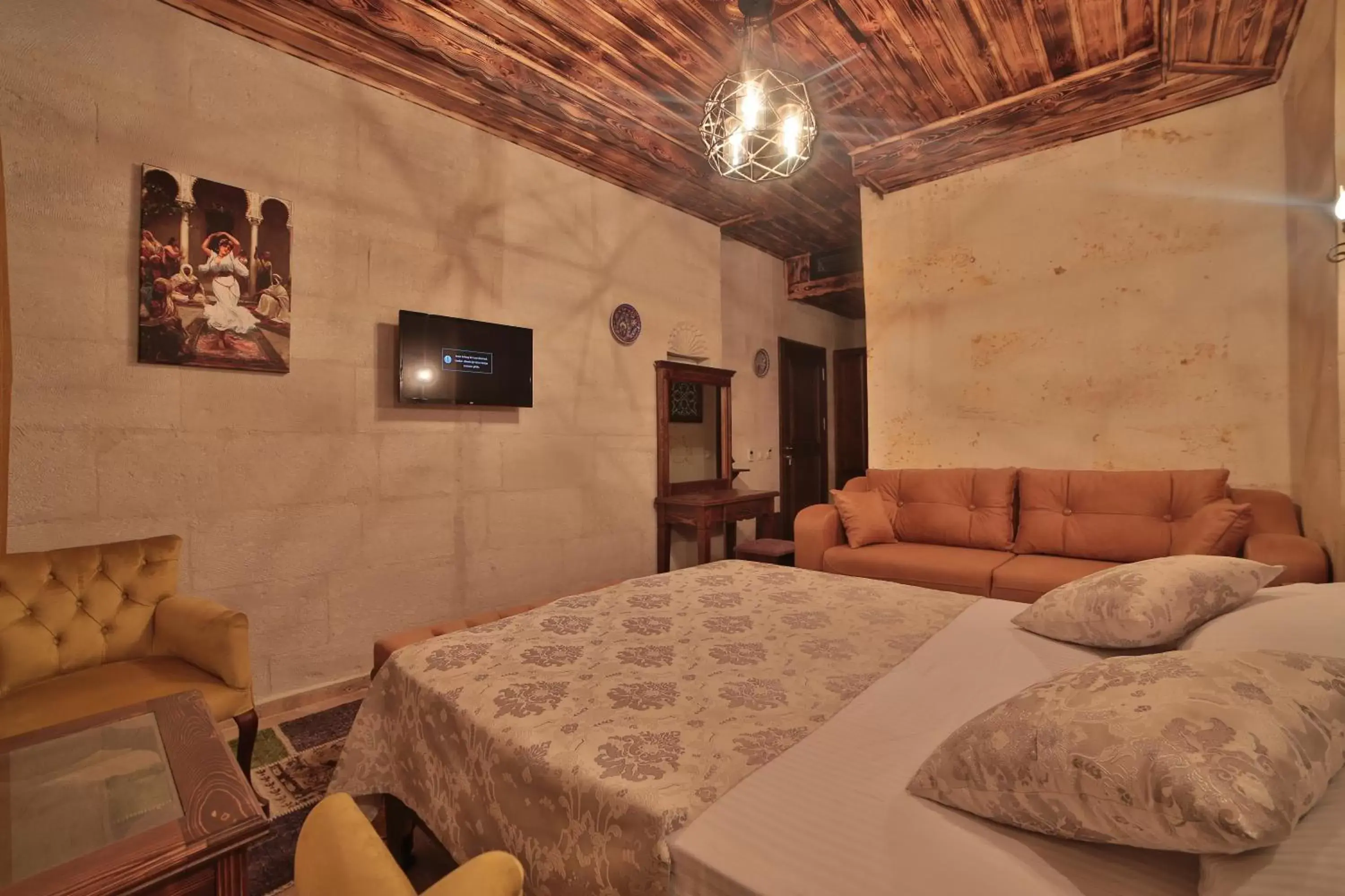 Bed in Caravanserai Inn Hotel