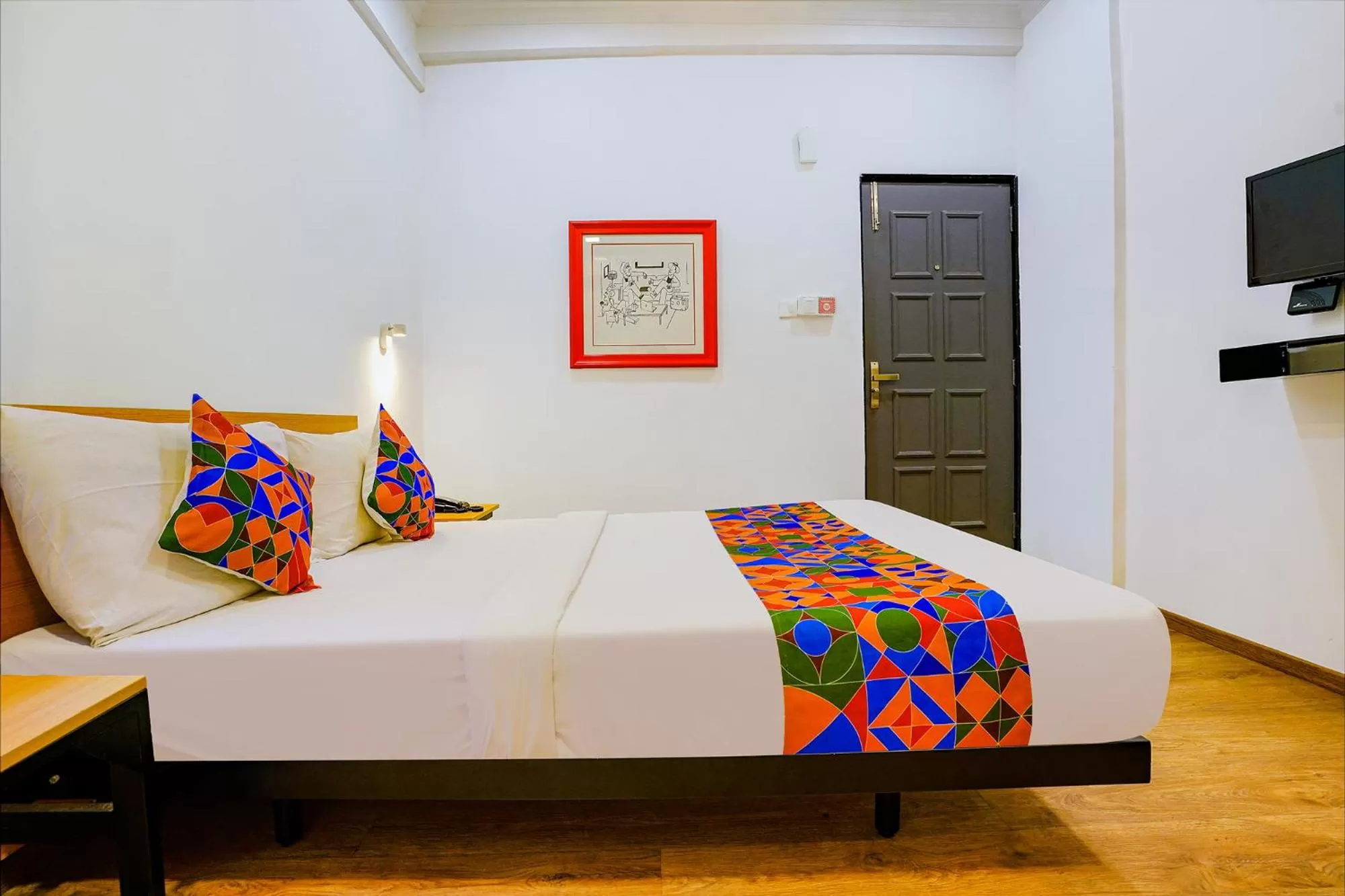 Communal lounge/ TV room, Bed in FabExpress Highway Residency