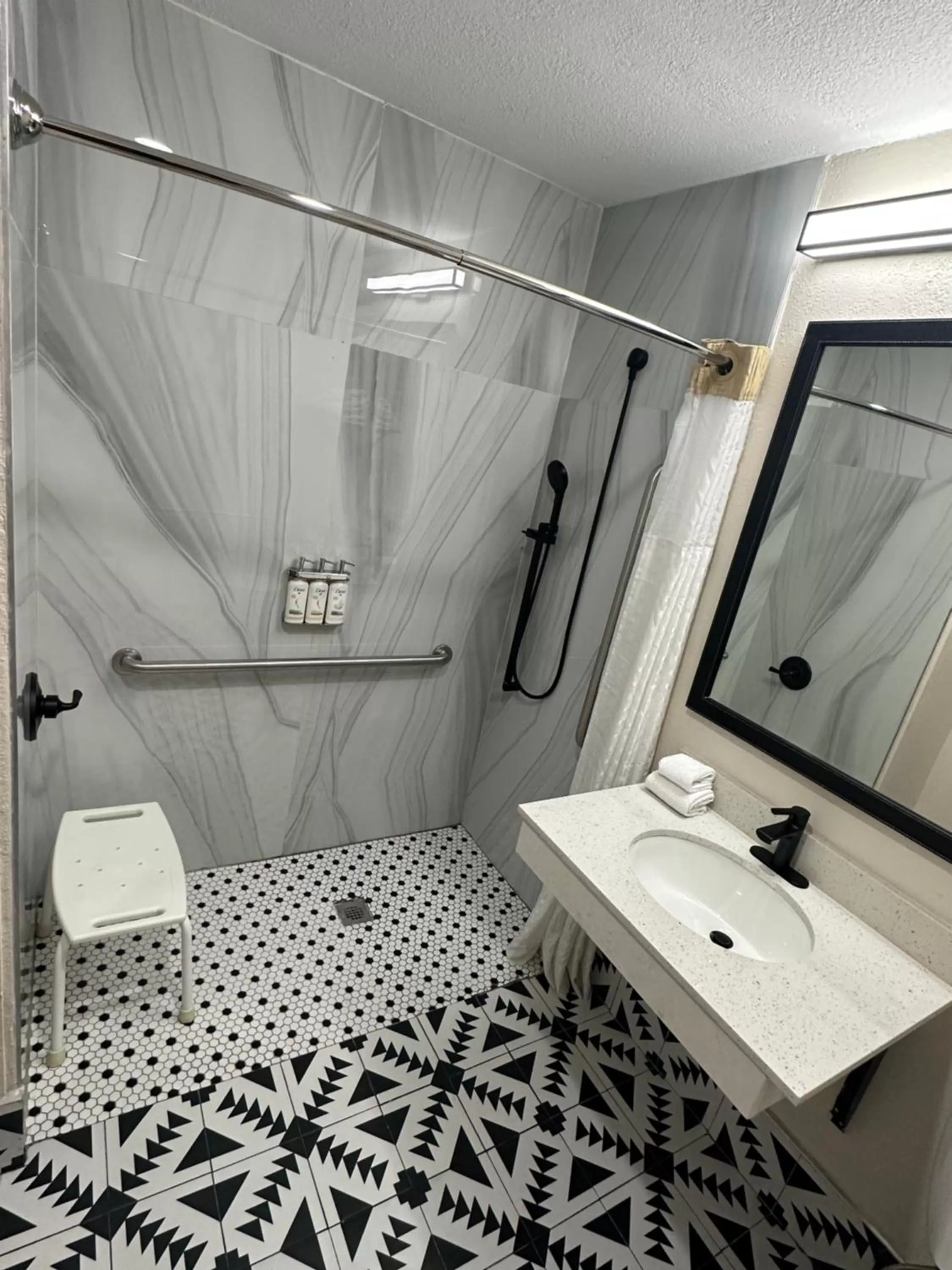 Shower in Days Inn by Wyndham Arlington