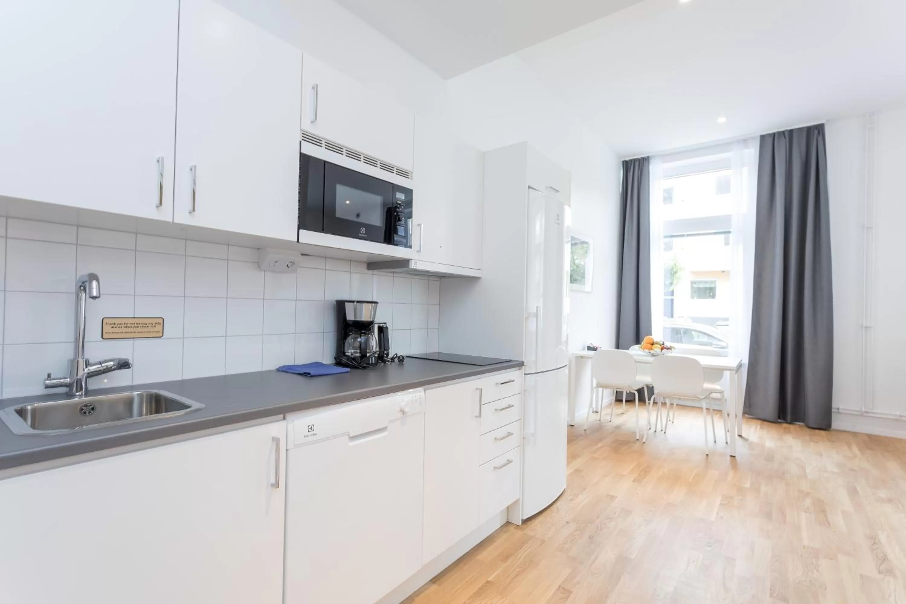Kitchen or kitchenette in ApartDirect Sundbyberg