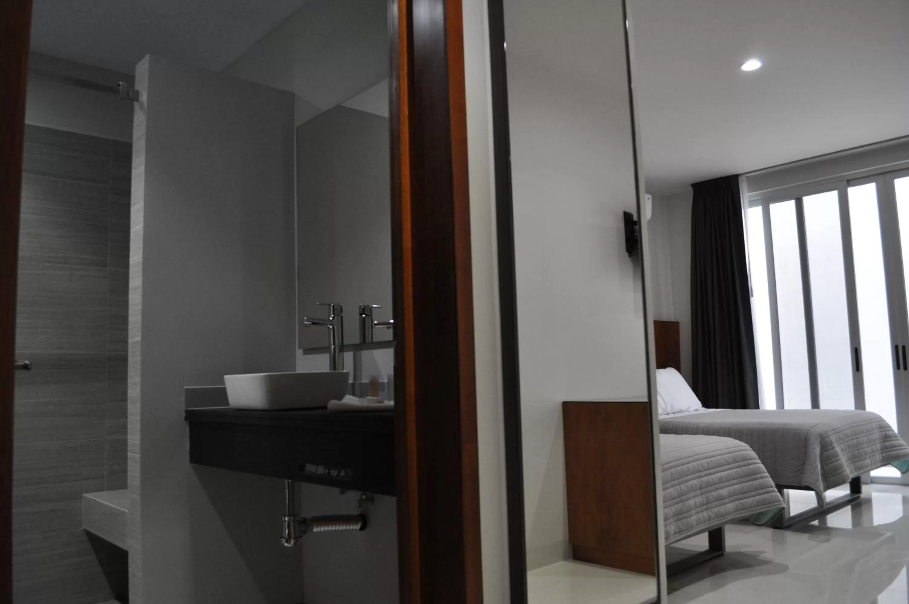 Bathroom, Bed in AMD Hotel