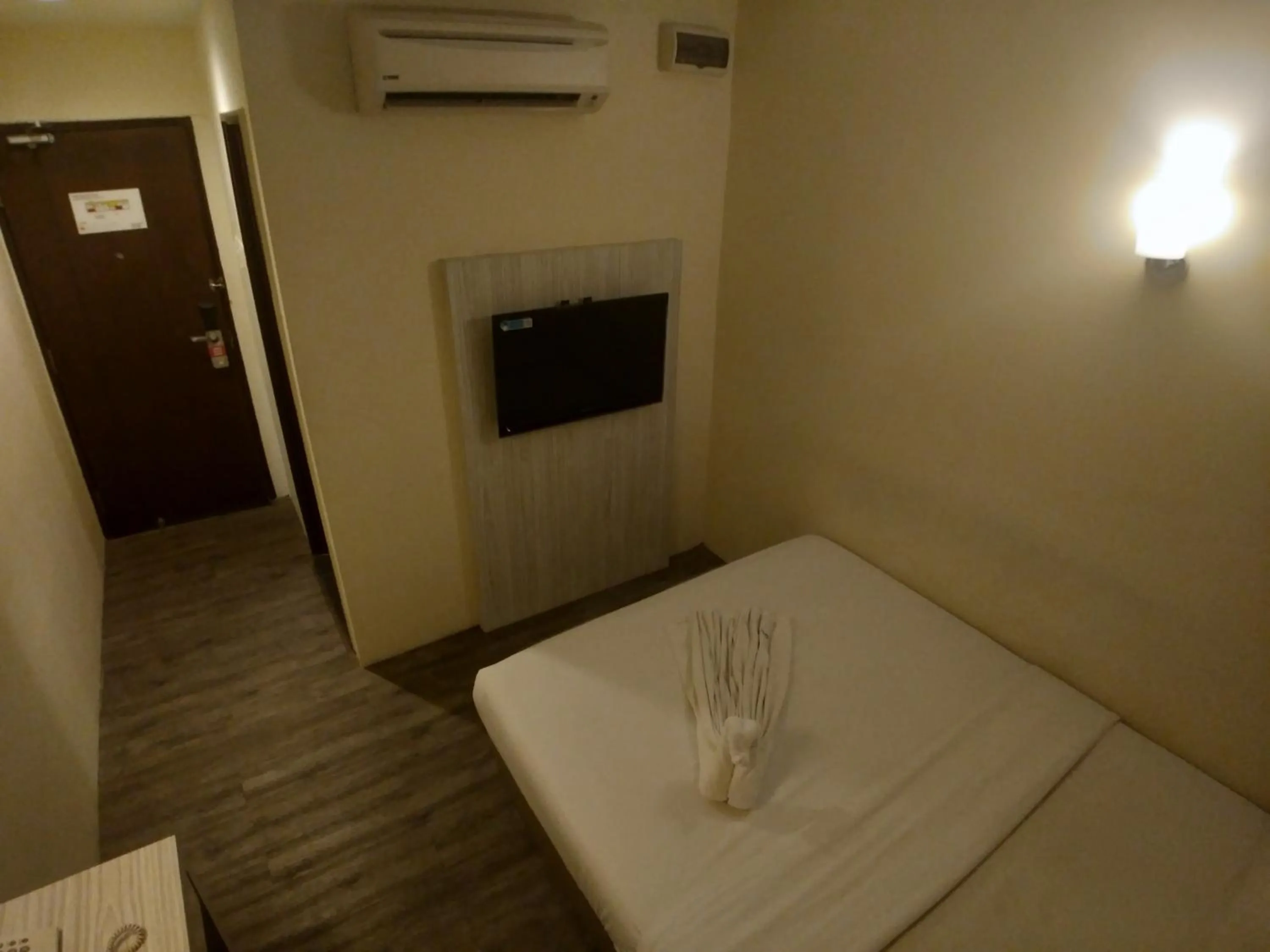 Communal lounge/ TV room, Bed in Hotel Westree KL Sentral