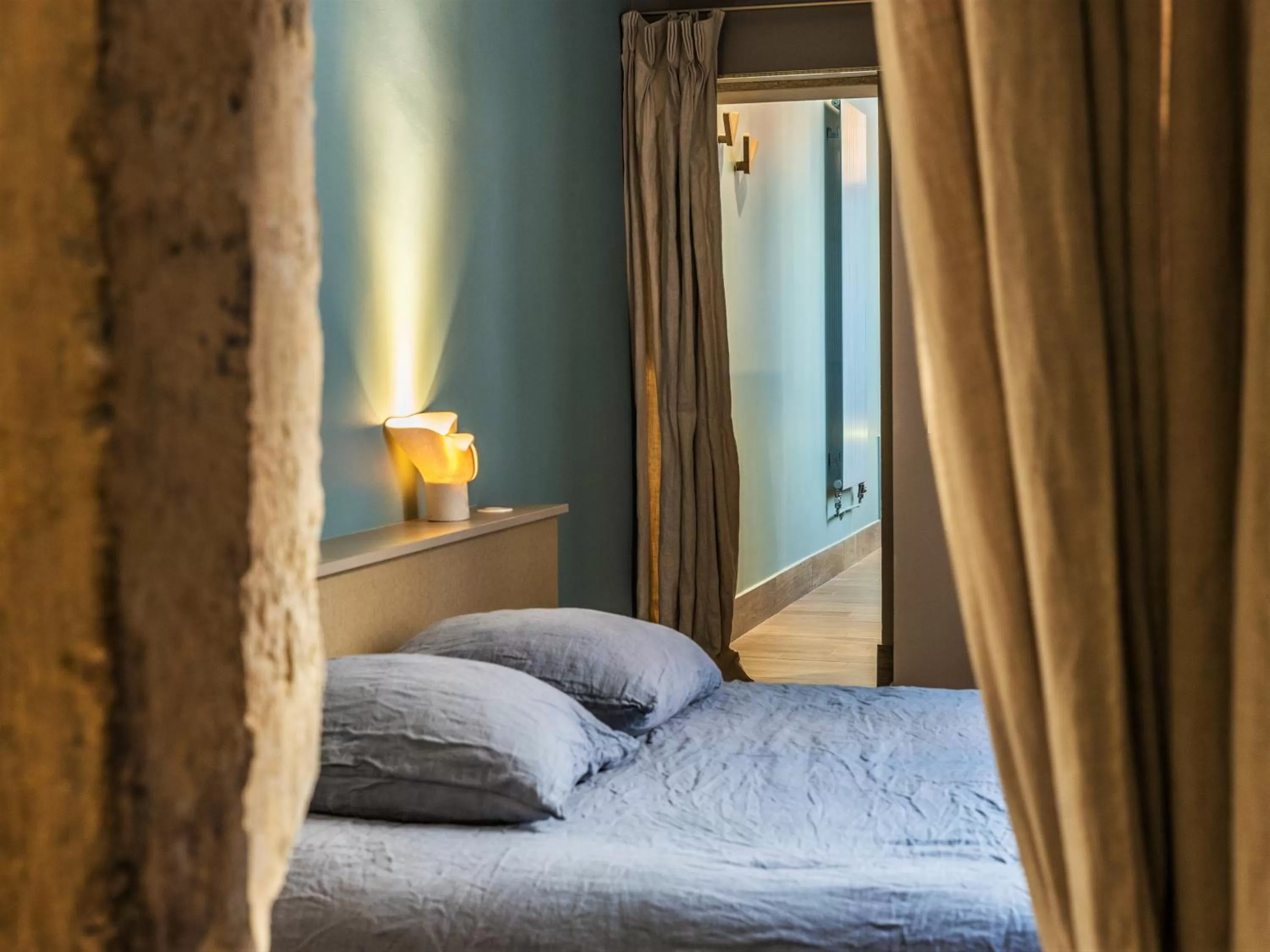 Bed in MiHotel Bellecour