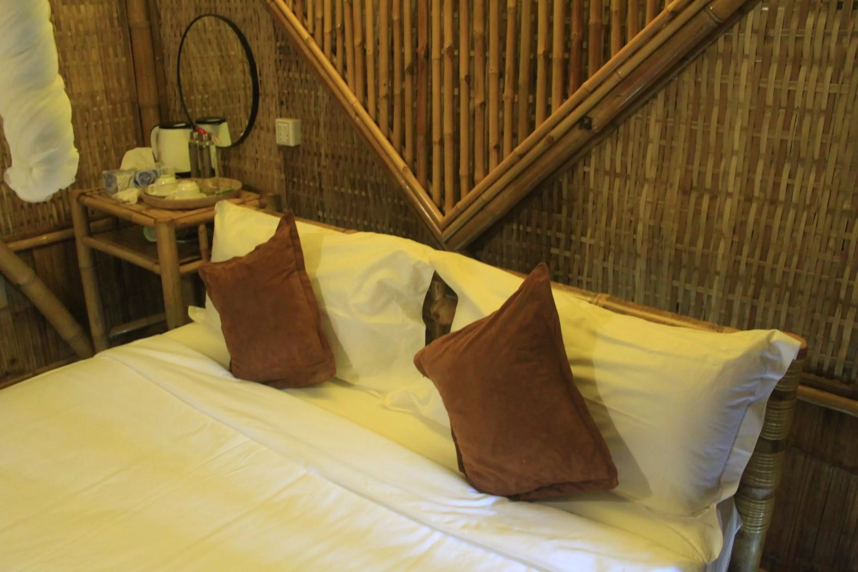 Bed in Hanchey Bamboo Resort