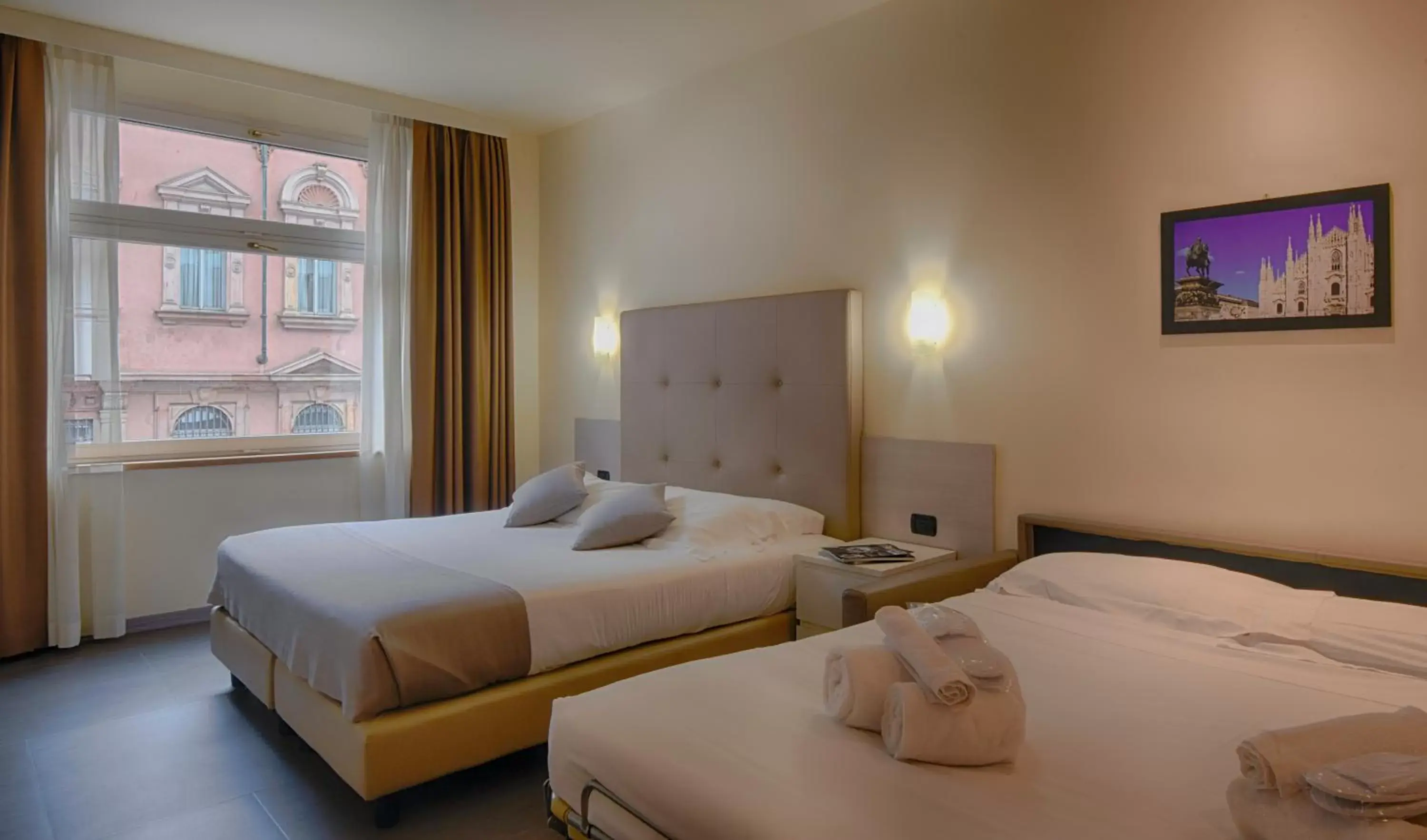 Bed in Duomo Hotel & Apartments