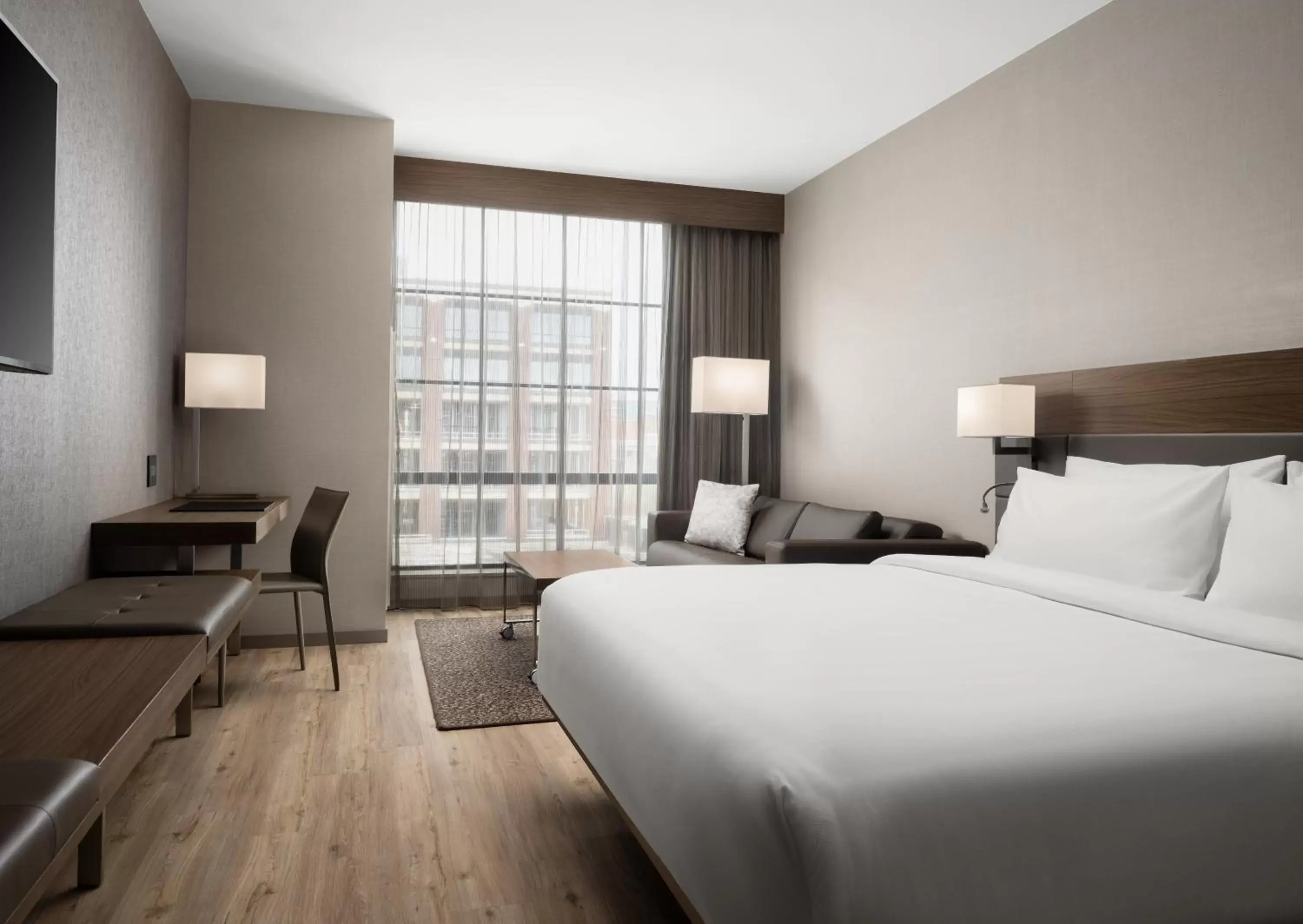 Bed in AC Hotel by Marriott Dayton