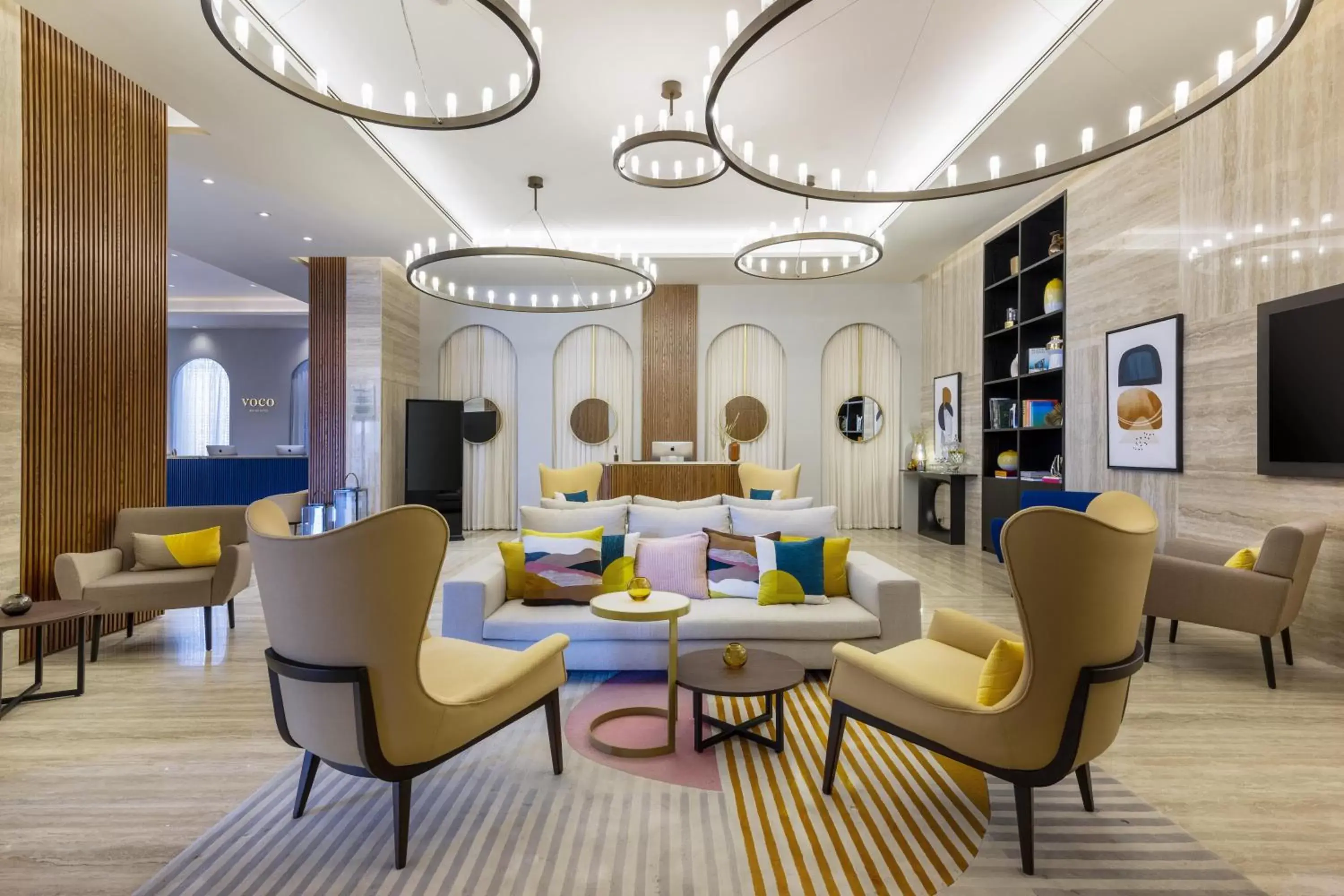 Lobby or reception in voco Doha West Bay Suites, an IHG Hotel