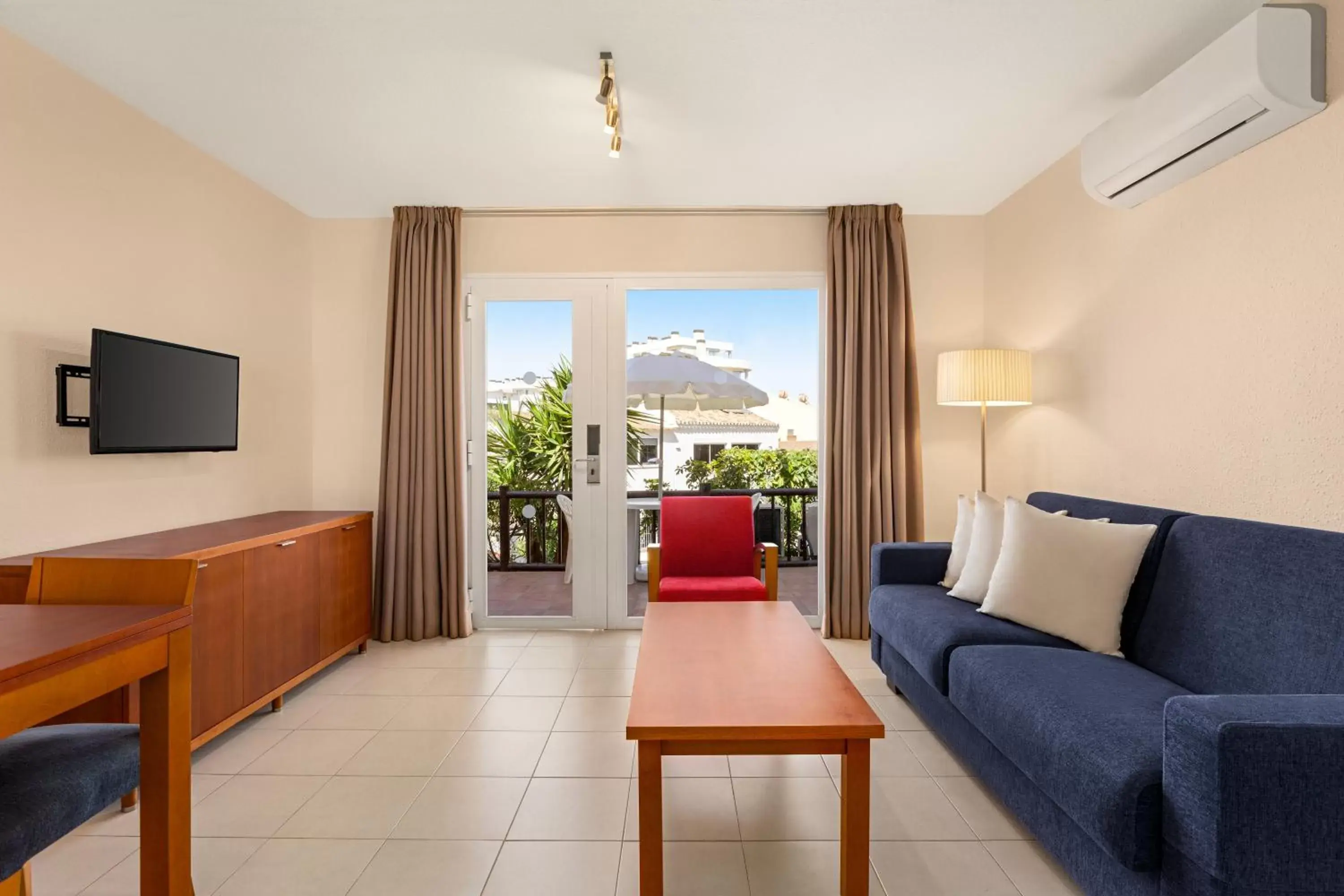 Living room in Ramada Hotel & Suites by Wyndham Costa del Sol