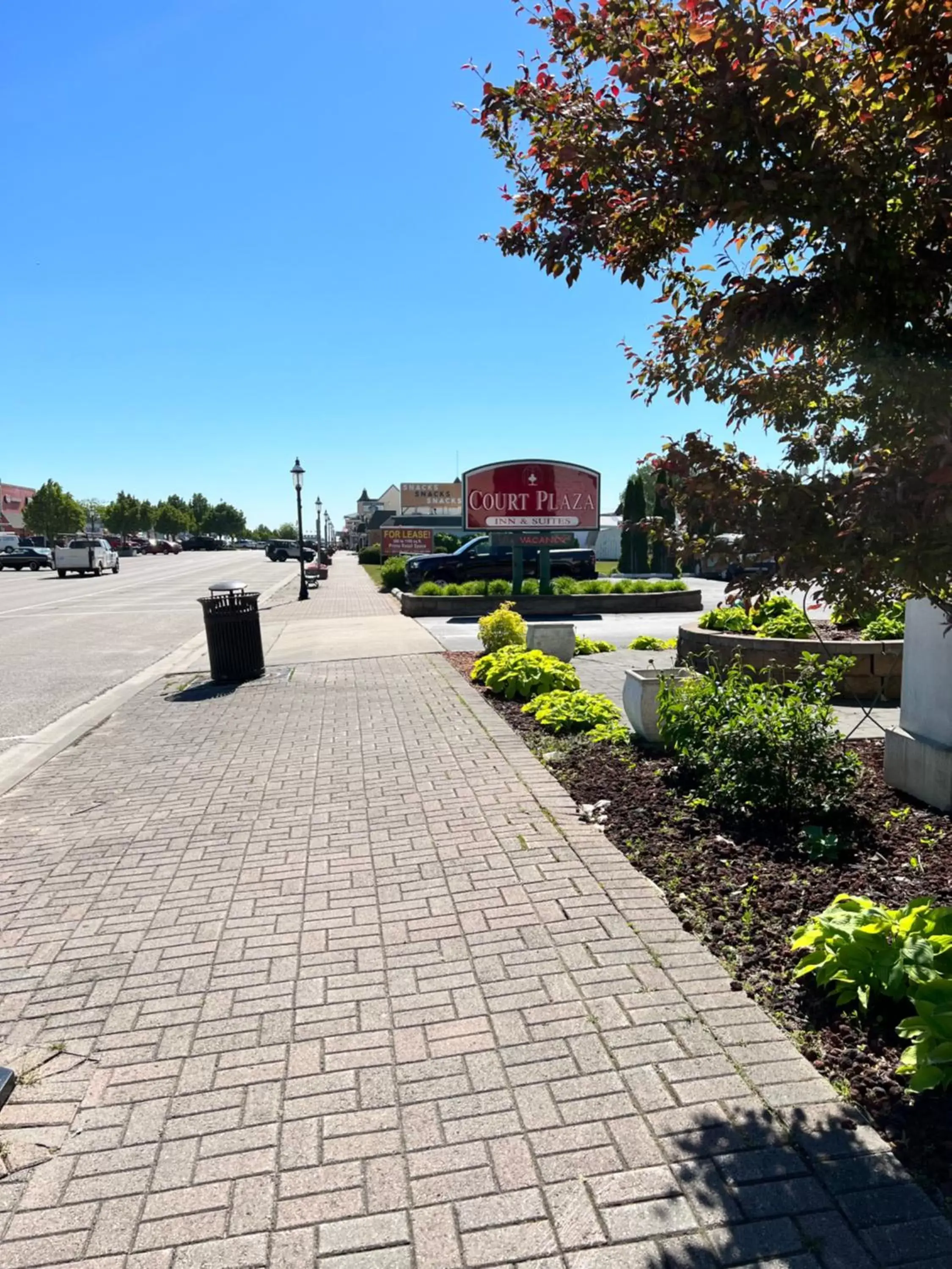 Property logo or sign in Court Plaza Inn & Suites of Mackinaw