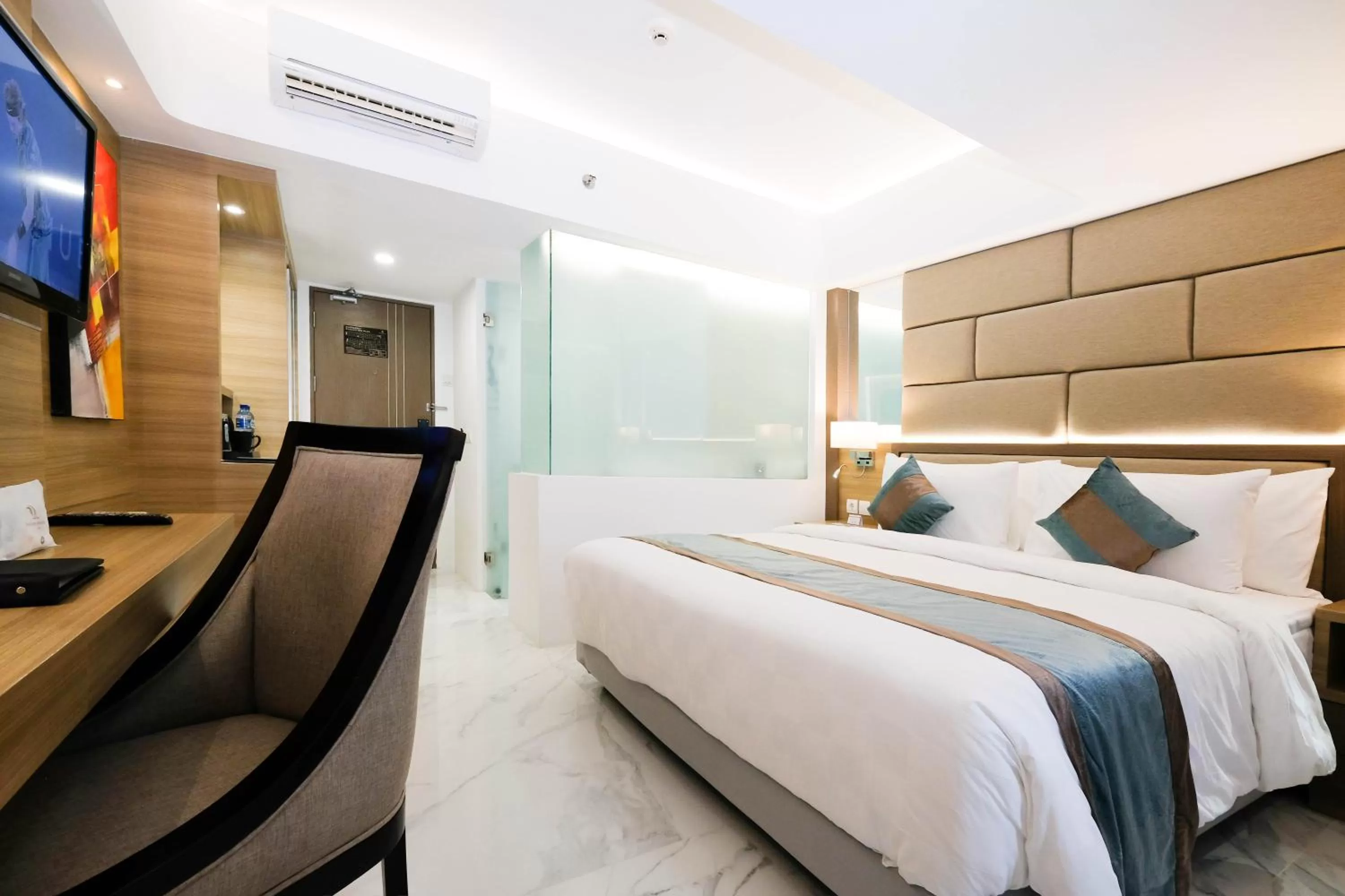 Bed in Dream of Aventus Hotel Kuta