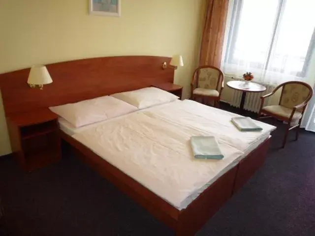 Bed in Hotel Krystal