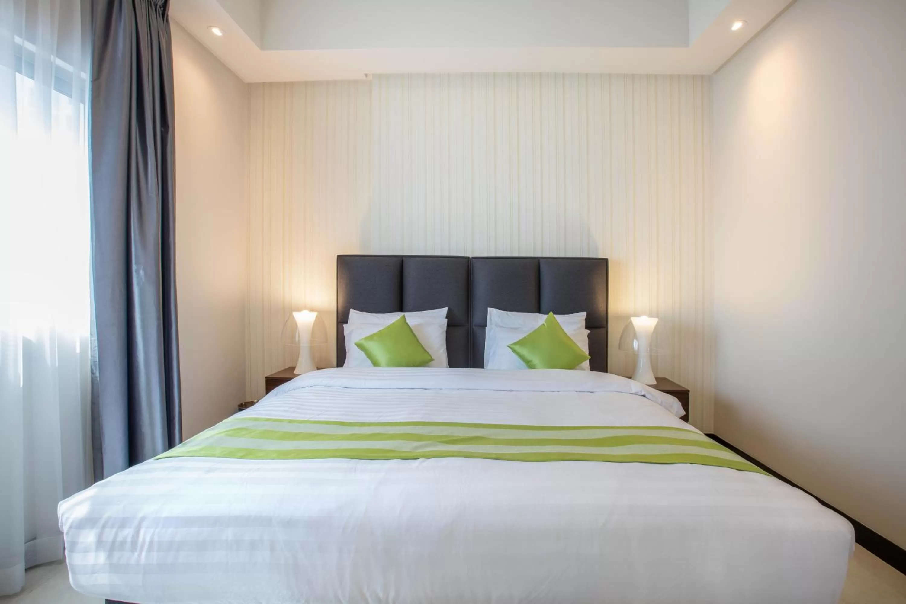 Bed in Loumage S Suites and Spa