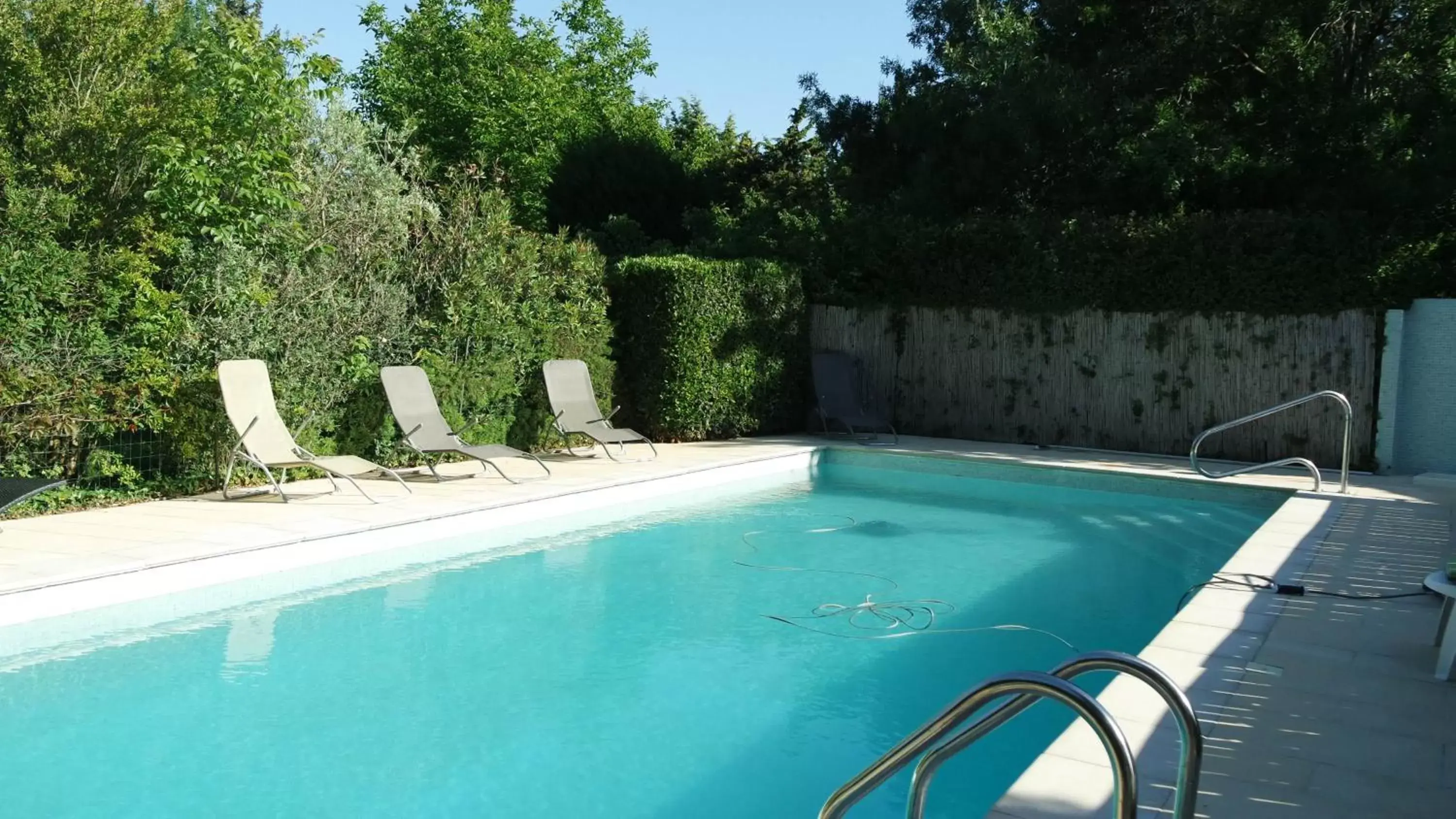 Swimming Pool in Mas Grimaud - Gîte- Studio et chambres d'hôtes familiales