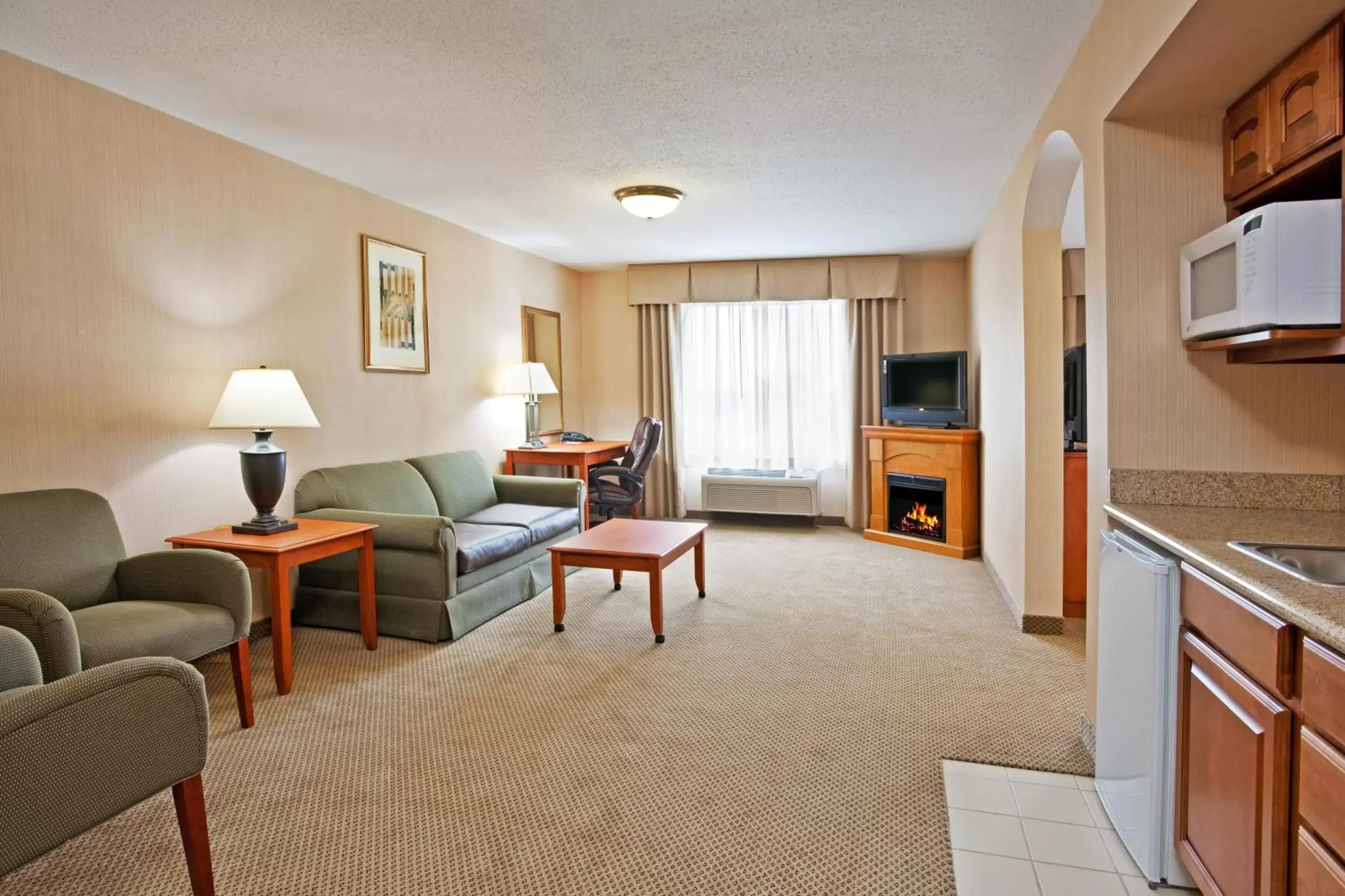 Bedroom, Seating Area in Holiday Inn Express Hotel & Suites Howell, an IHG Hotel