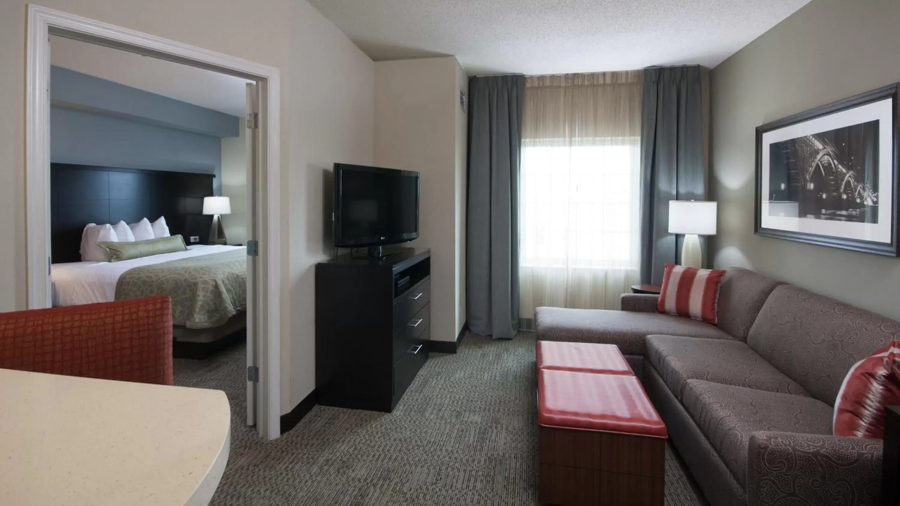 Photo of the whole room, TV/Entertainment Center in Staybridge Suites Buffalo-Amherst, an IHG Hotel
