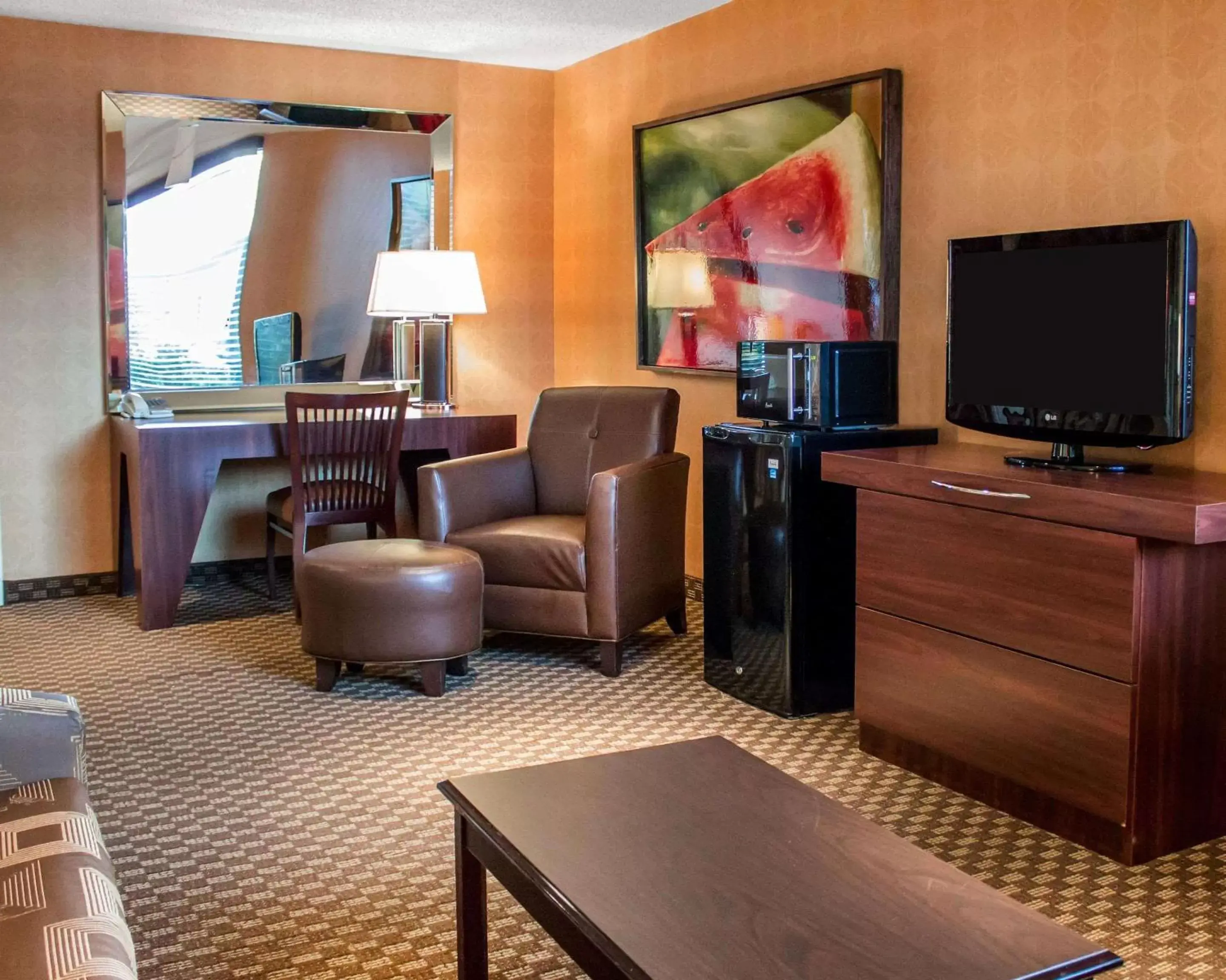 Photo of the whole room, TV/Entertainment Center in The Woodlands Inn