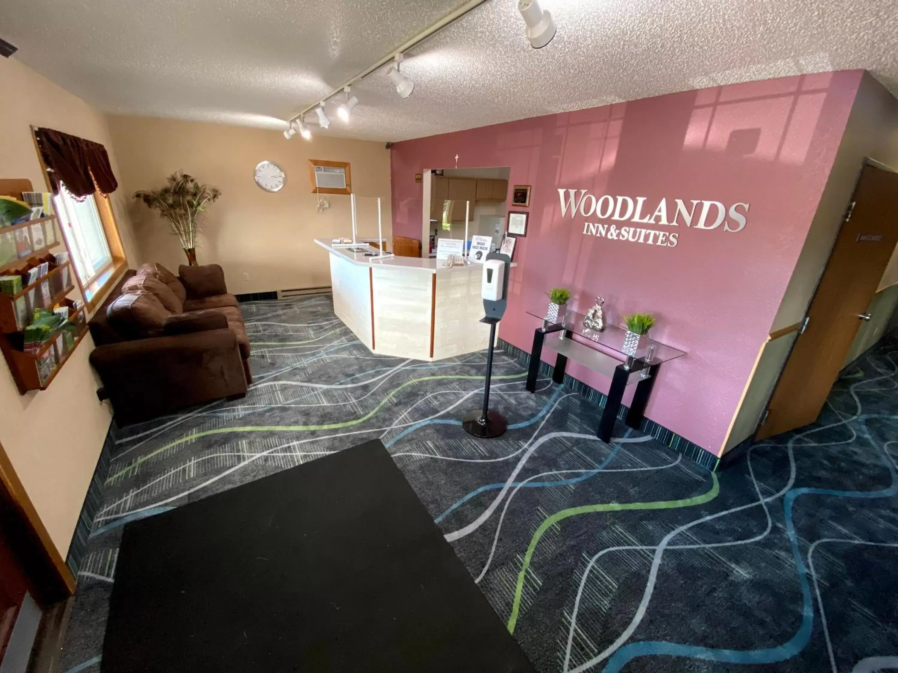 Lobby or reception in Woodland Inn & Suites