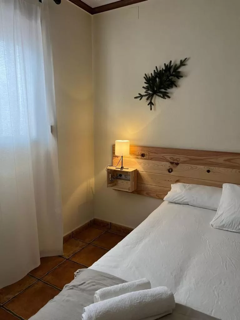 Bed in El Bosque Suites&Room