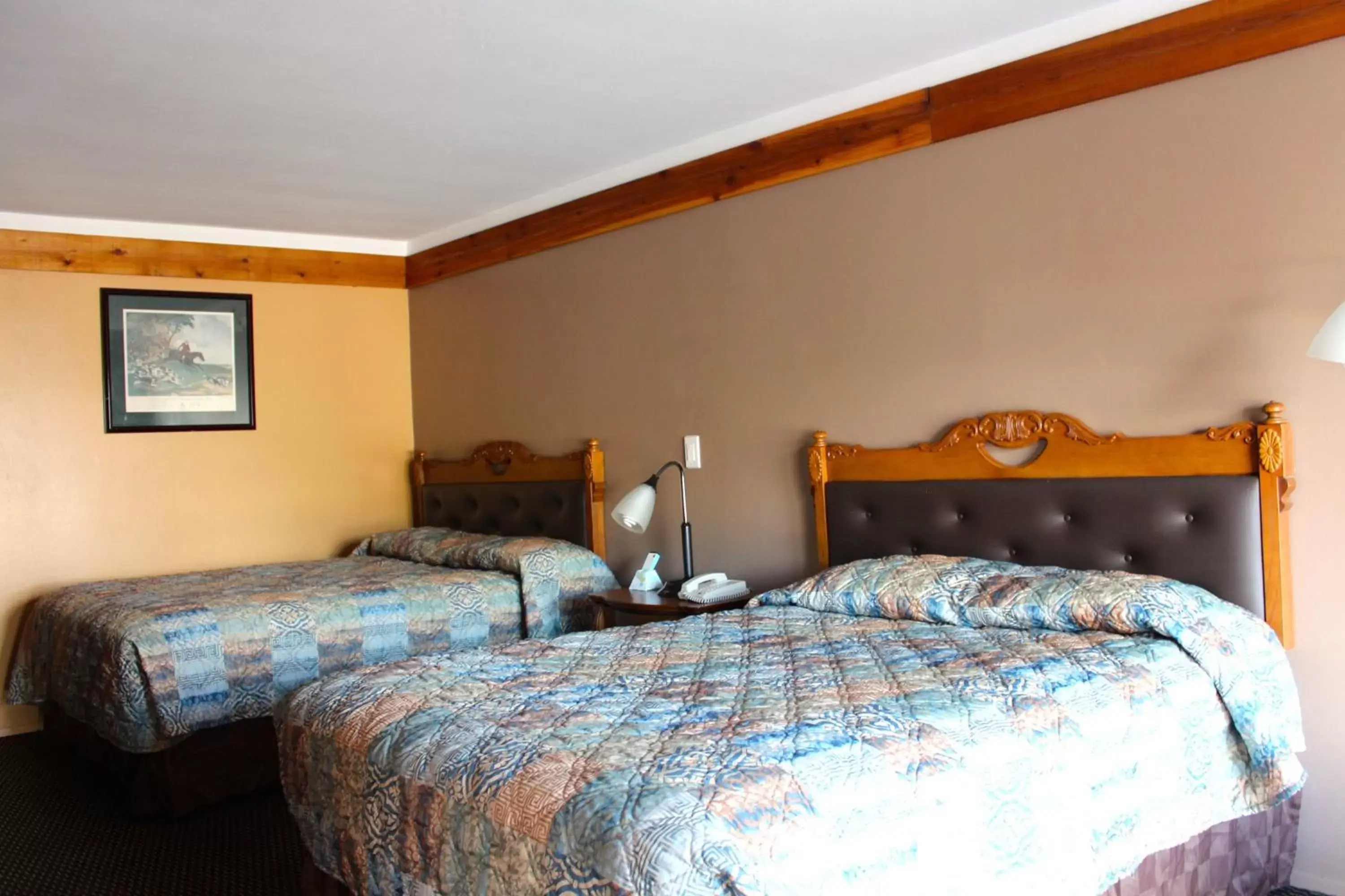 Bed in Executive Inn Goliad