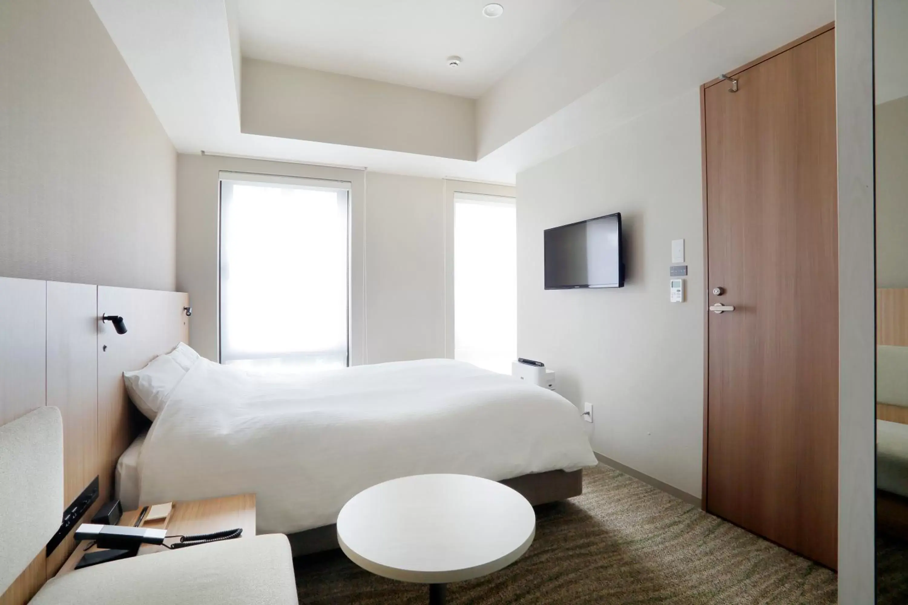 Bed in JR Inn Sapporo-eki Minami-guchi Bed in JR Inn Sapporo-eki Minami-guchi