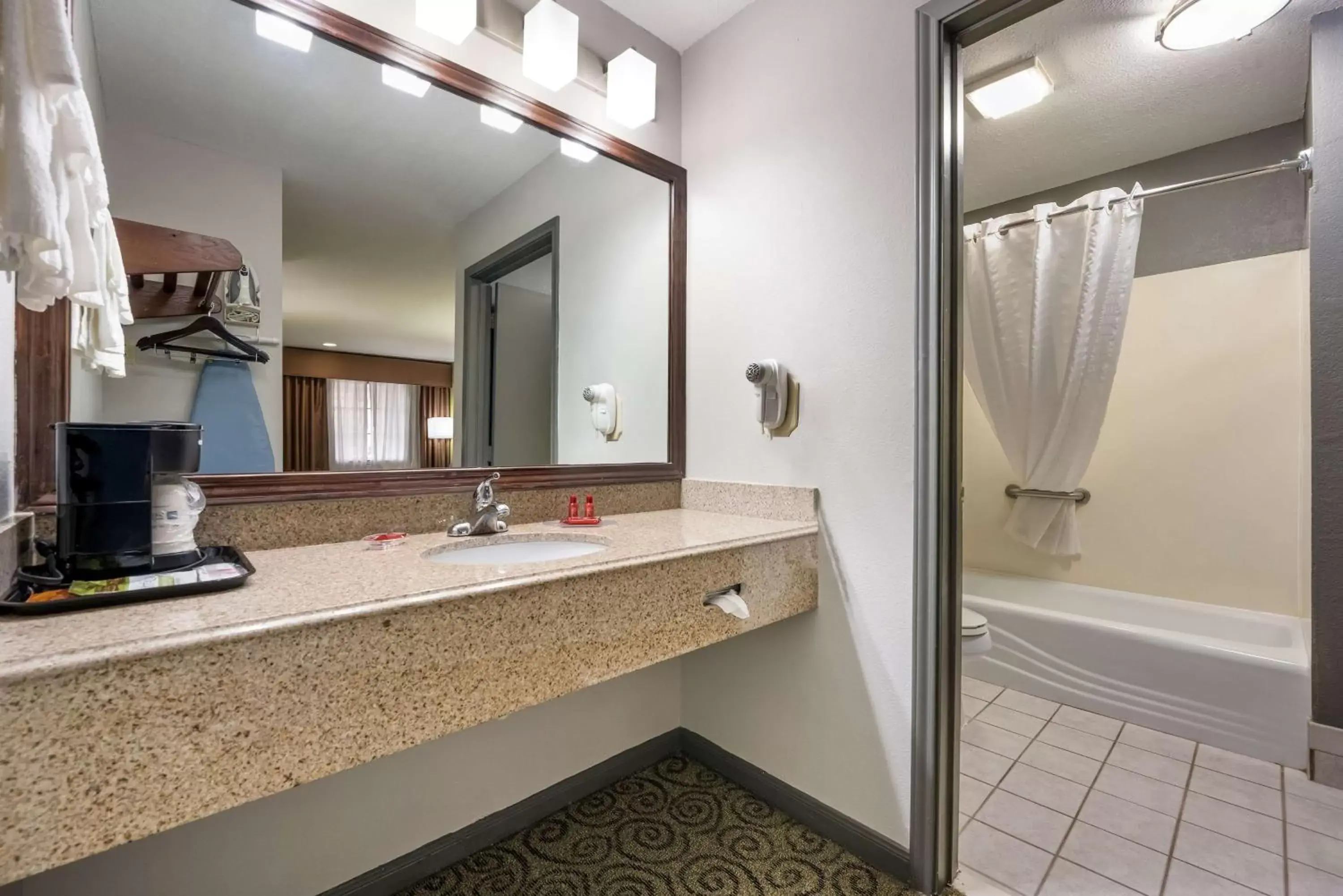 Bathroom in SureStay Hotel by Best Western Deer Park