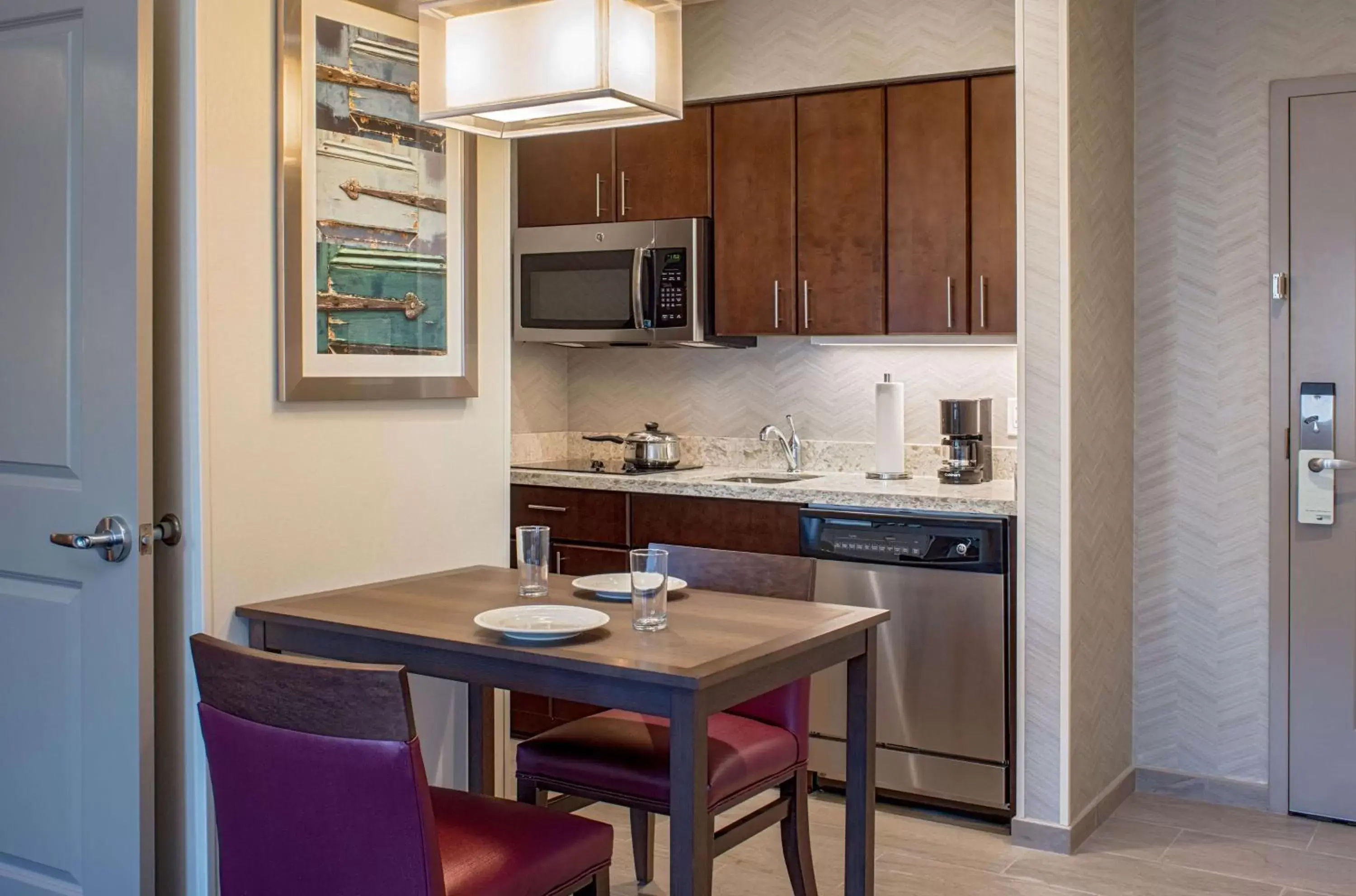Kitchen or kitchenette, Kitchen/Kitchenette in Homewood Suites By Hilton New Orleans French Quarter