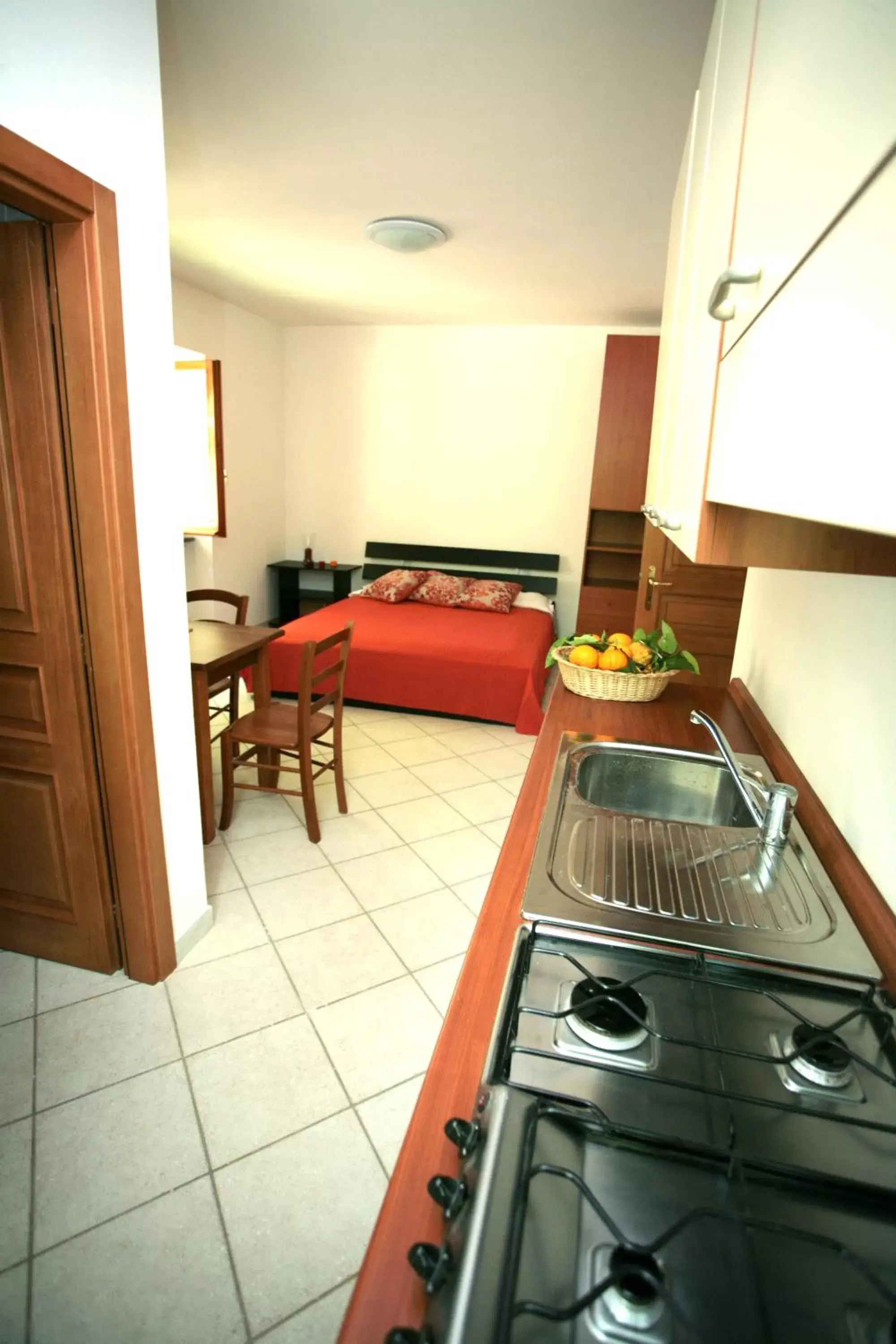 Toilet, Kitchen/Kitchenette in Agriturismo b&b L arancio In fiore