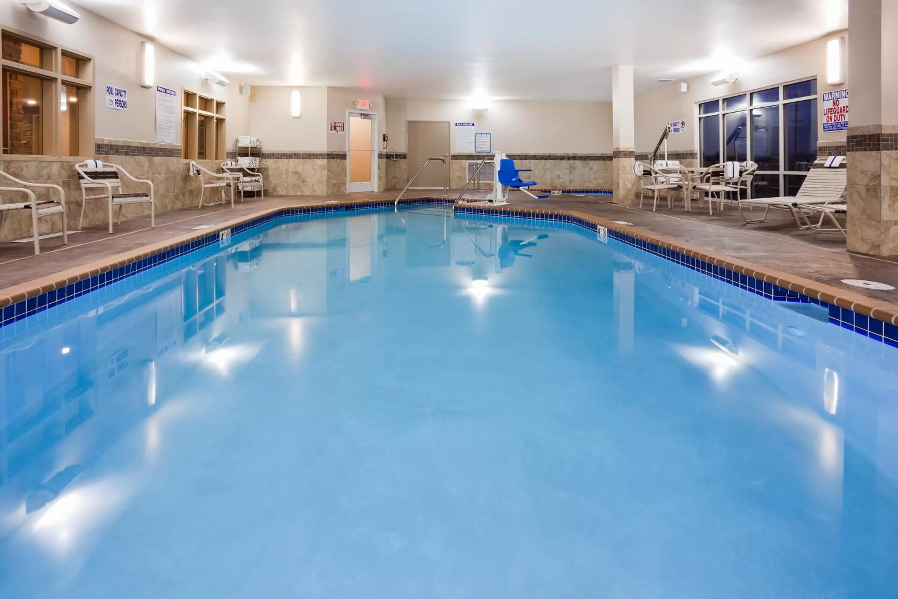 Swimming pool in AmericInn by Wyndham DeWitt