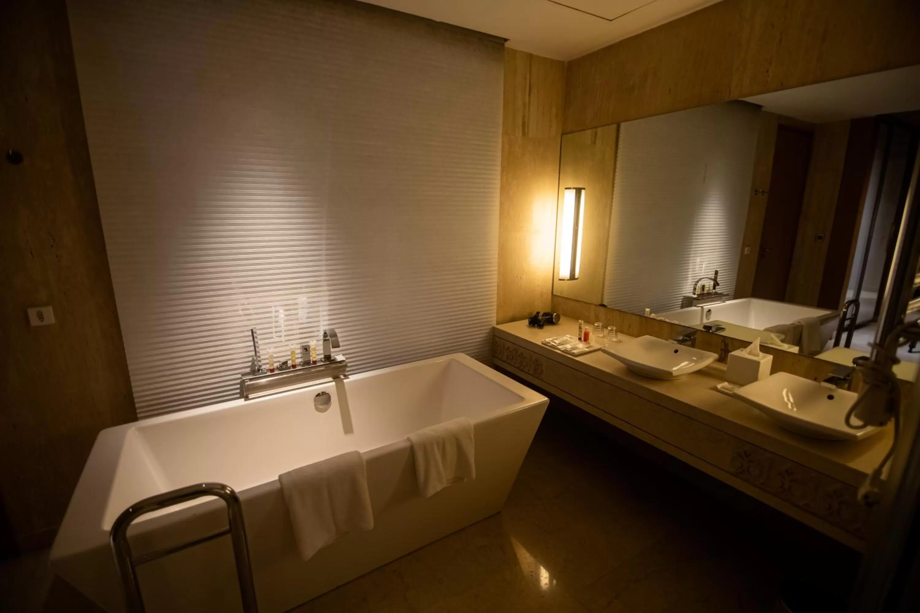 Bathroom, Bed in Crowne Plaza Greater Noida by IHG