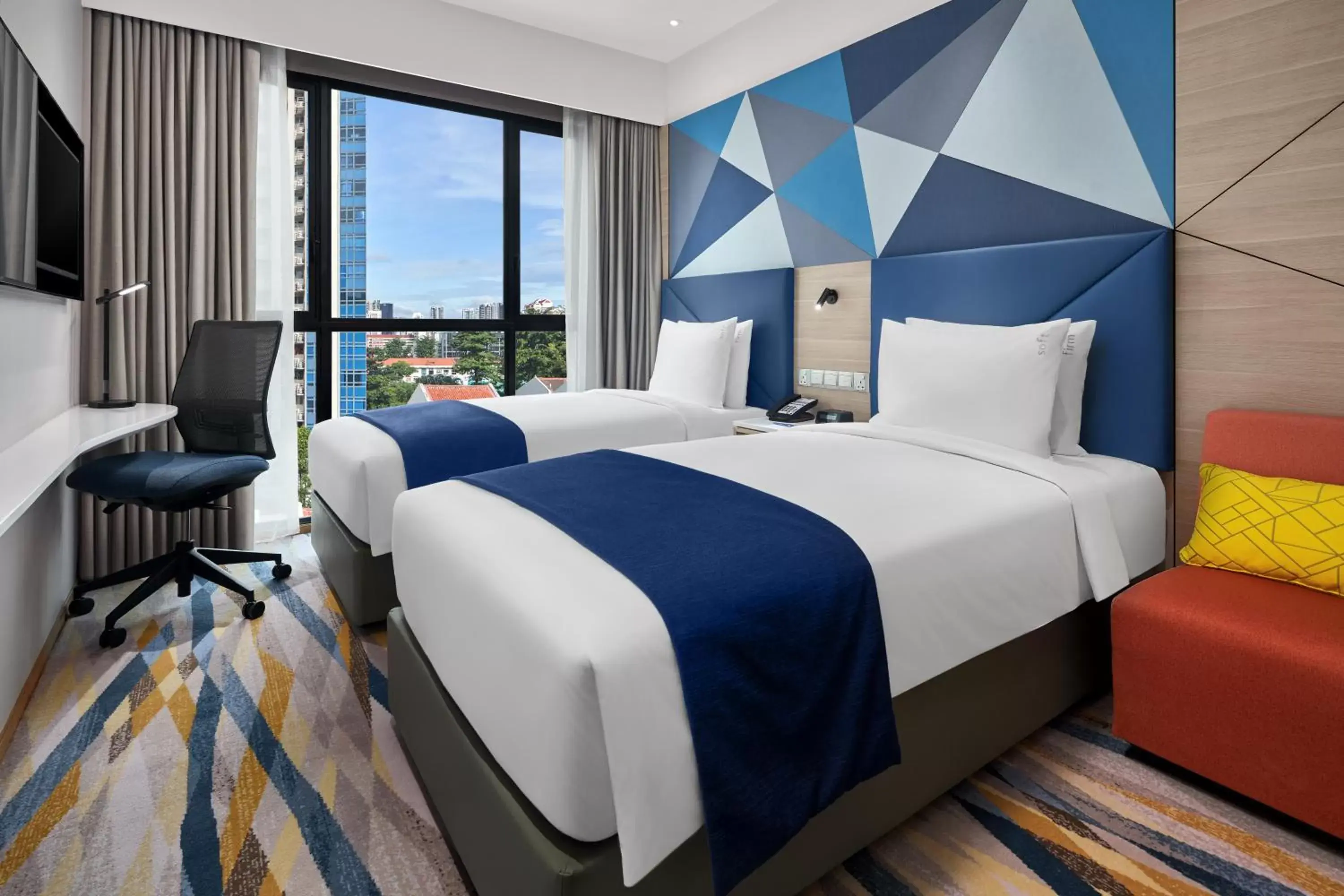 Bed in Holiday Inn Express Singapore Serangoon, an IHG Hotel
