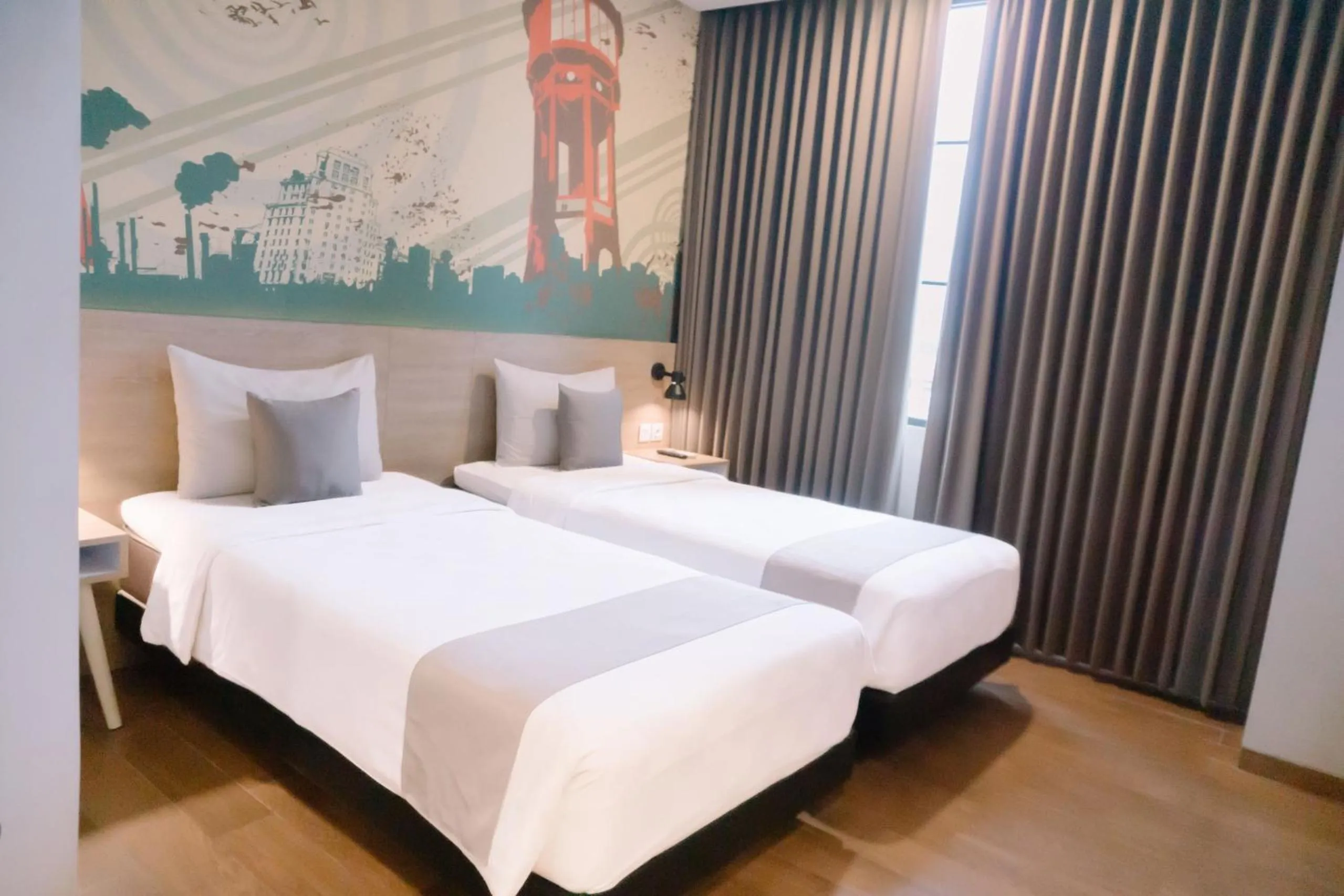 Bed in Meotel Jember by Dafam