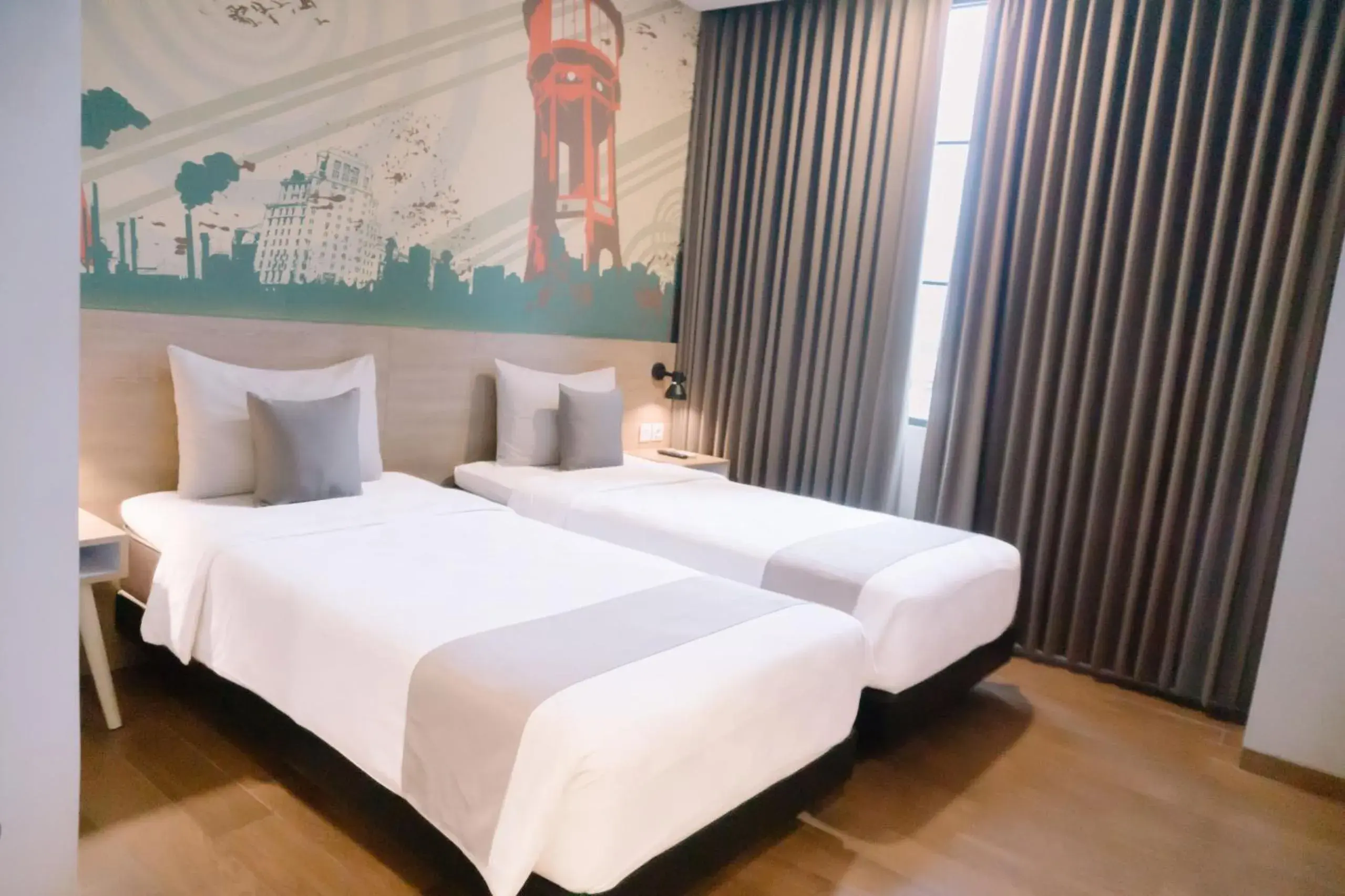 Bed in Meotel Jember by Dafam