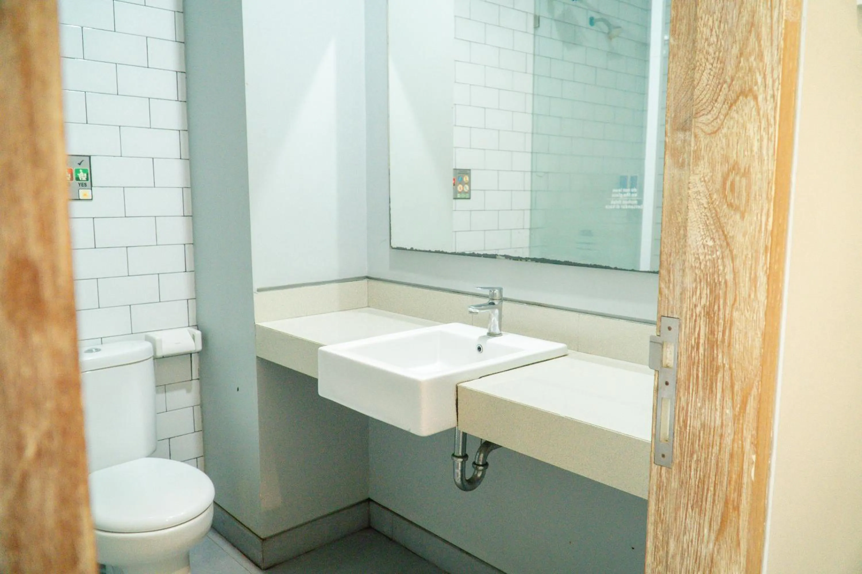 Bathroom in Gemini Star Hotel Kuta