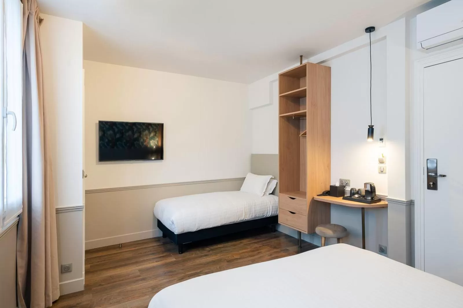 Bed in Hôtel 31 - Paris Tour Eiffel