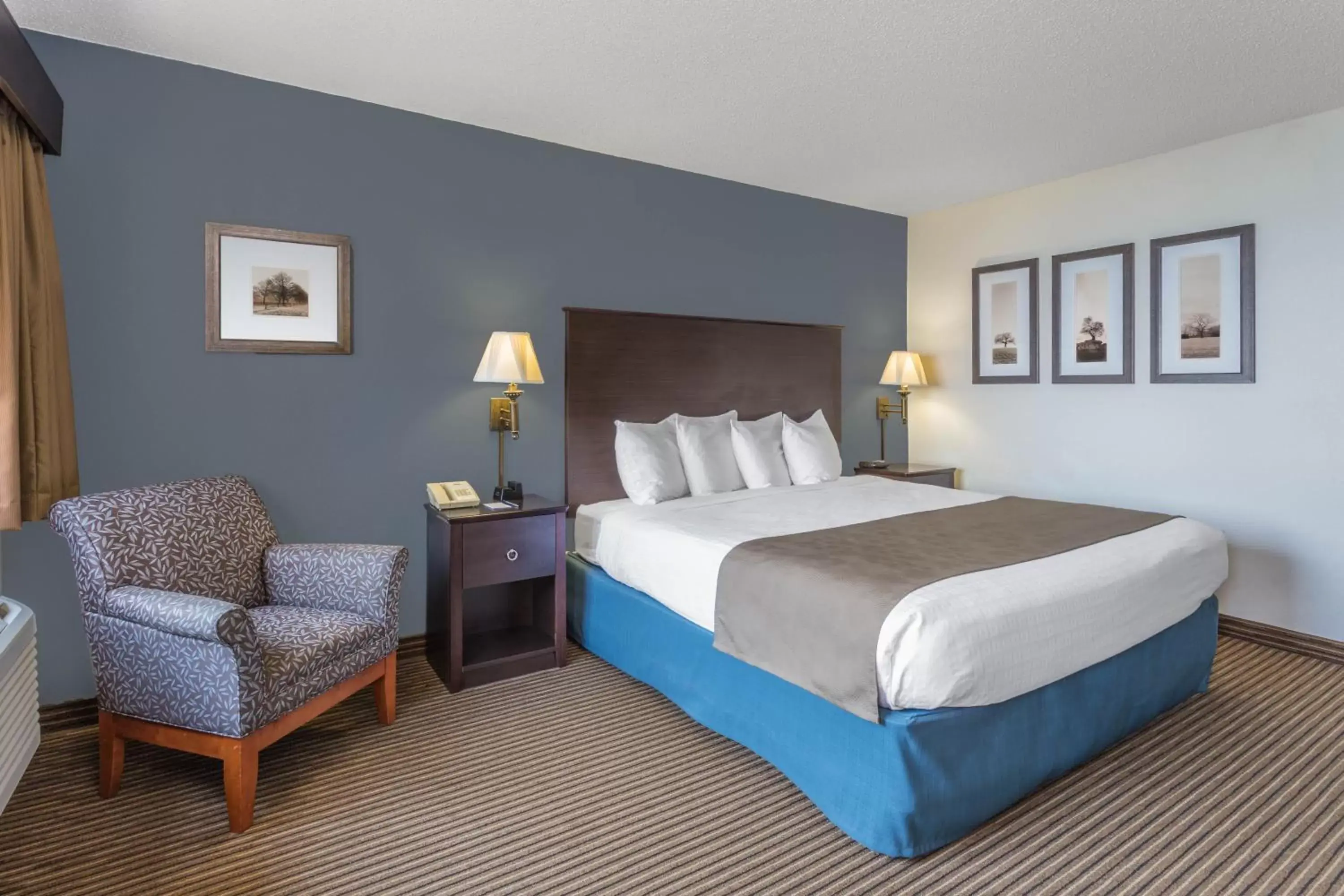 Photo of the whole room, Bed in AmericInn by Wyndham Menominee