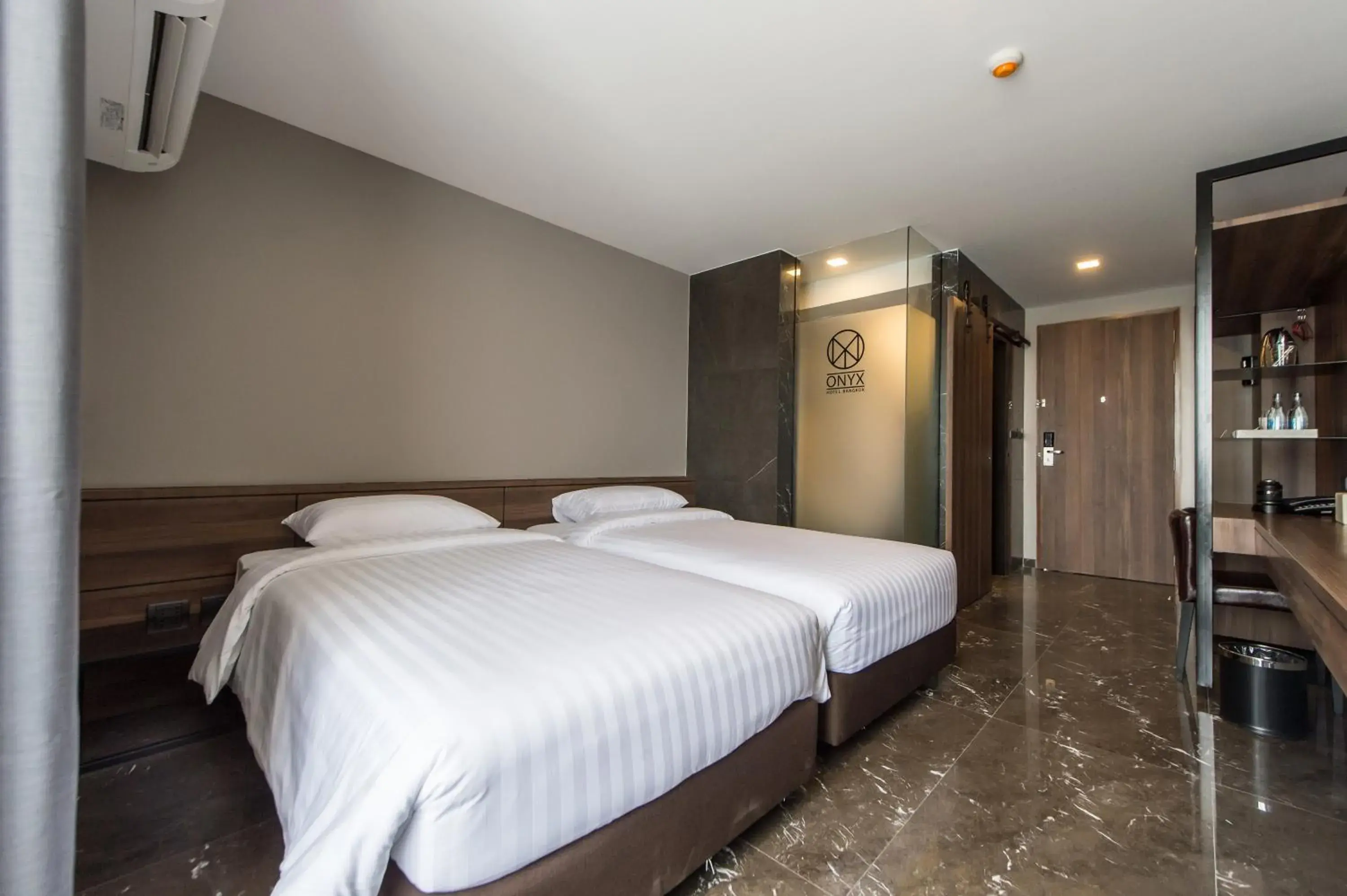 Bed in Onix Hotel Bangkok