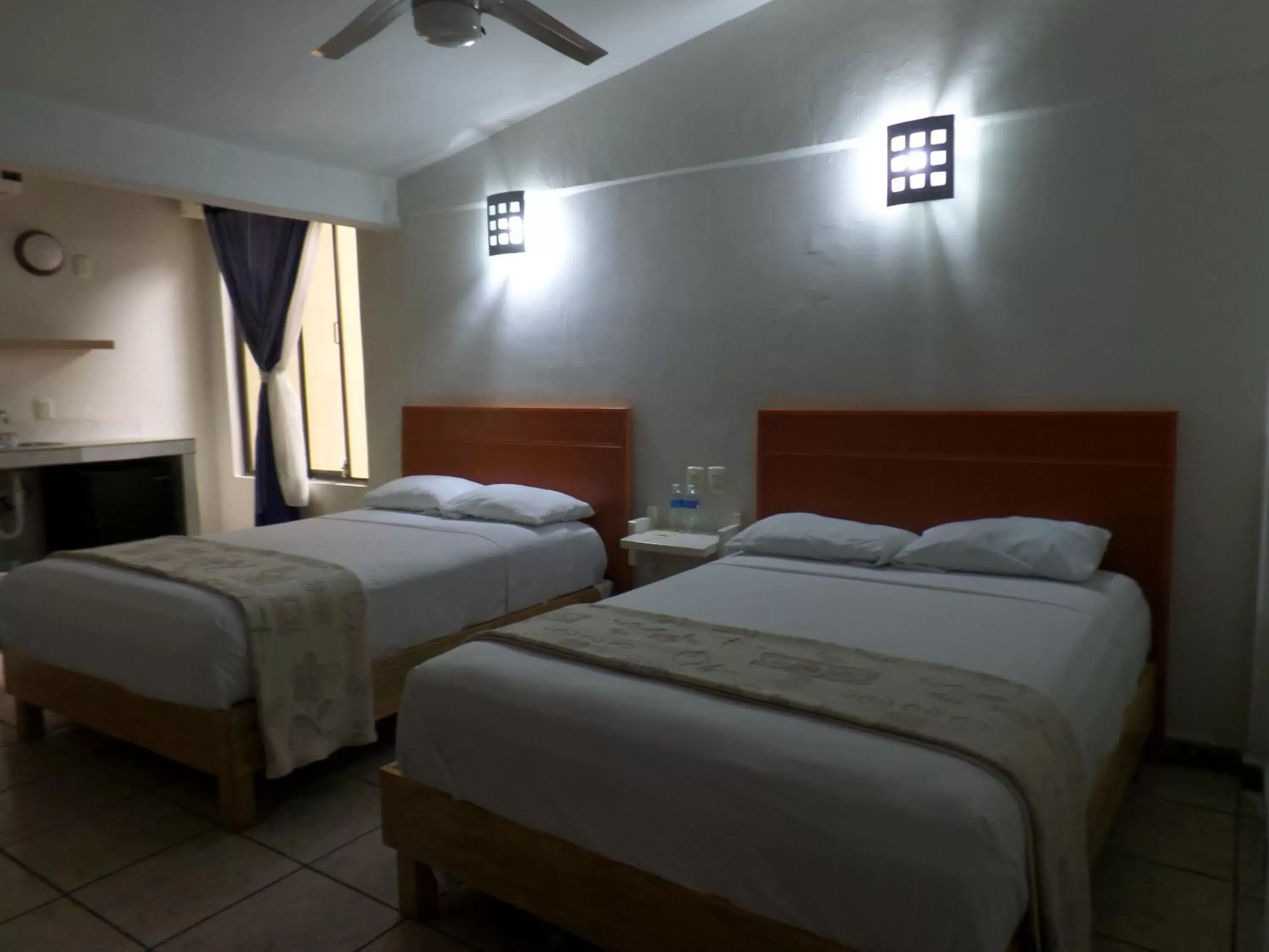 Bed in Uke Inn Hotel & Suites Xamaipak