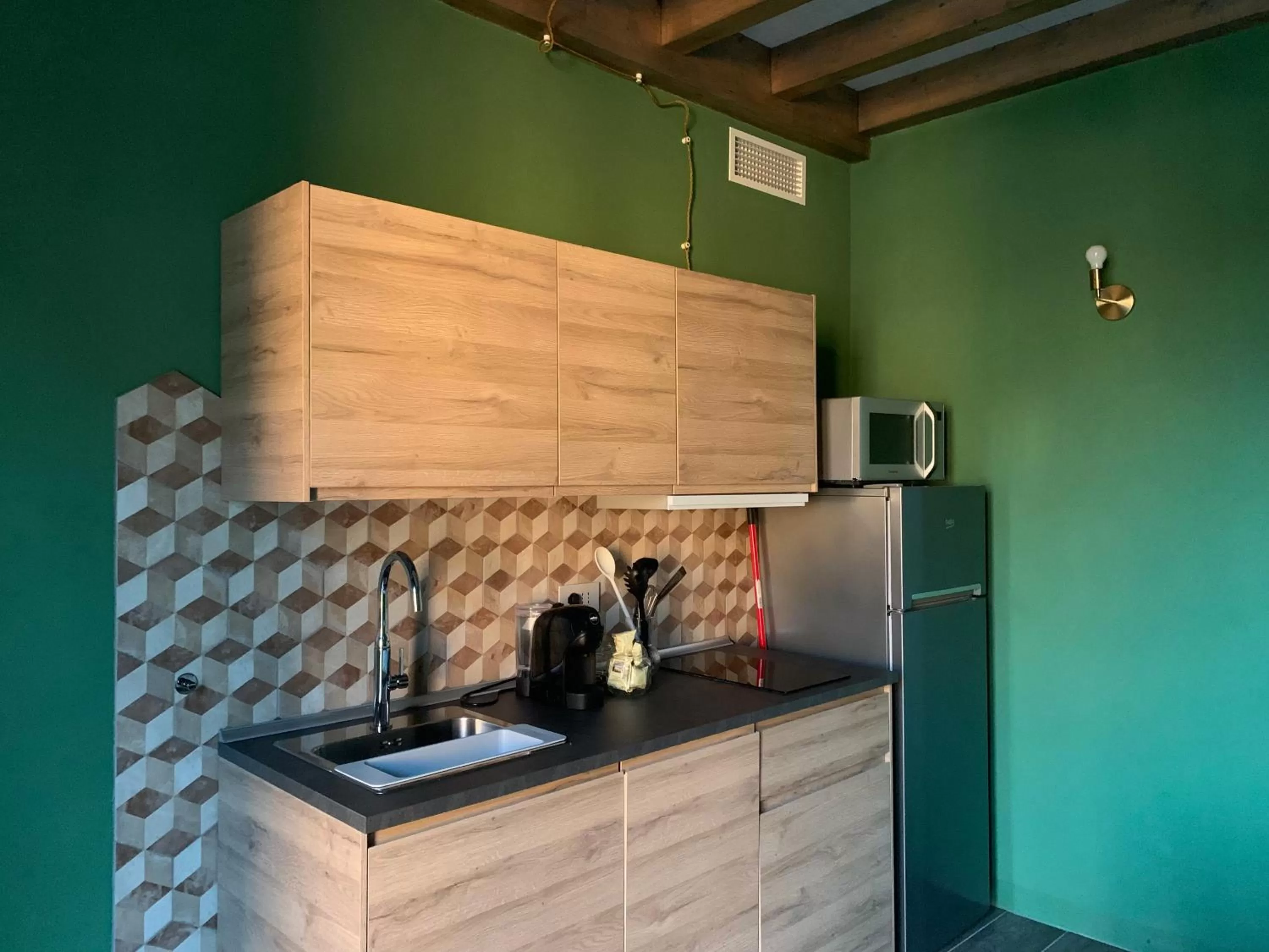 Kitchen/Kitchenette in Sala dell Estate Guest House